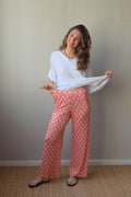 Pantalón estampado fuego bolsillos naranja