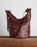 Bolso Piel Bucket Tachuelas Burdeos