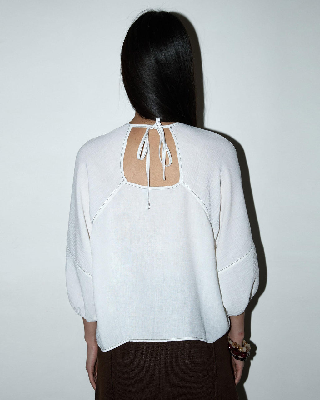 Blusa Escote Espalda Costuras Blanca