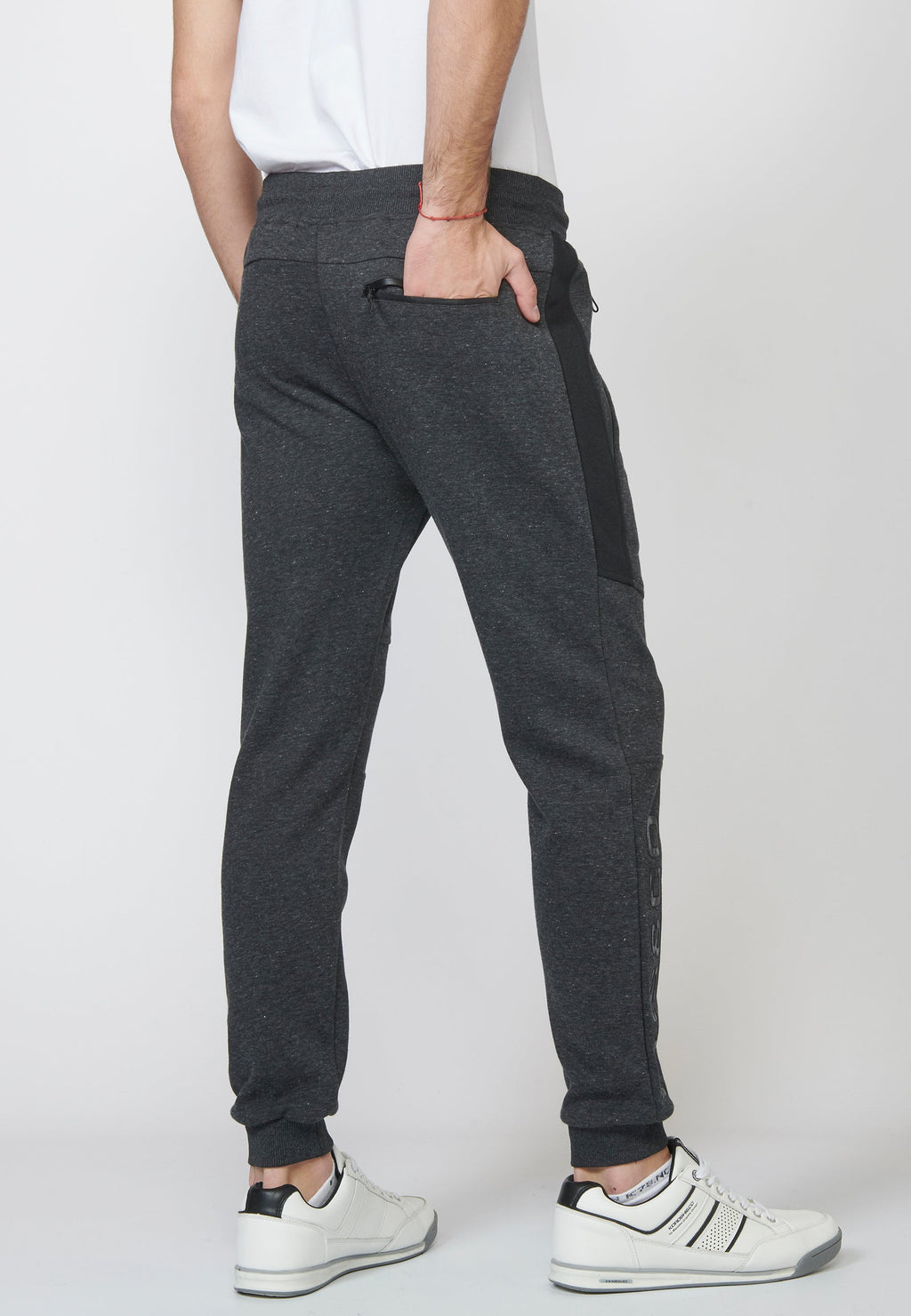 Pantalón largo deportivo jogger interlock con cintura elástica ajustable con cordón para hombre