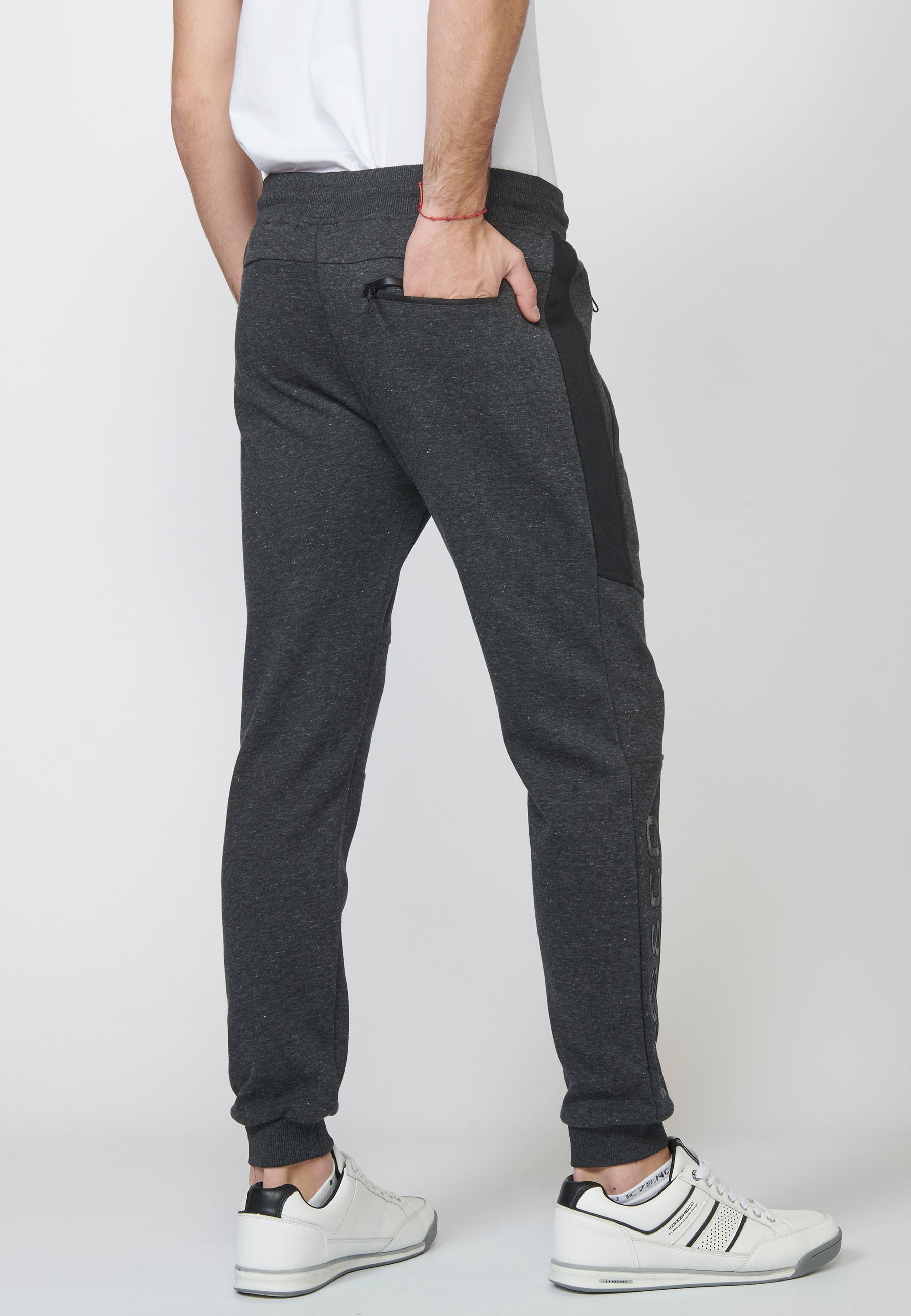 Pantalón largo deportivo jogger interlock con cintura elástica ajustable con cordón para hombre