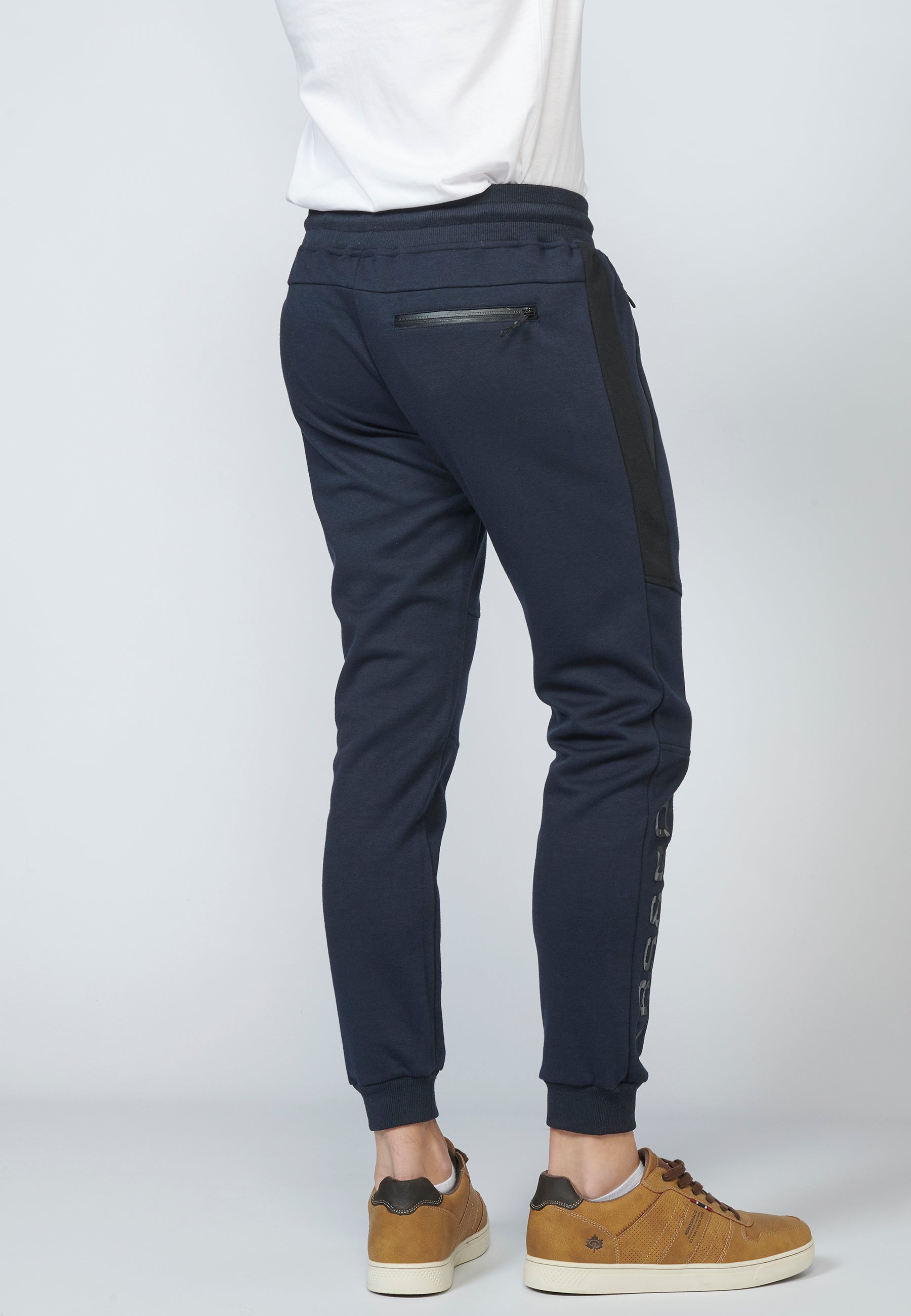 Pantalón largo deportivo jogger interlock con cintura elástica ajustable con cordón para hombre