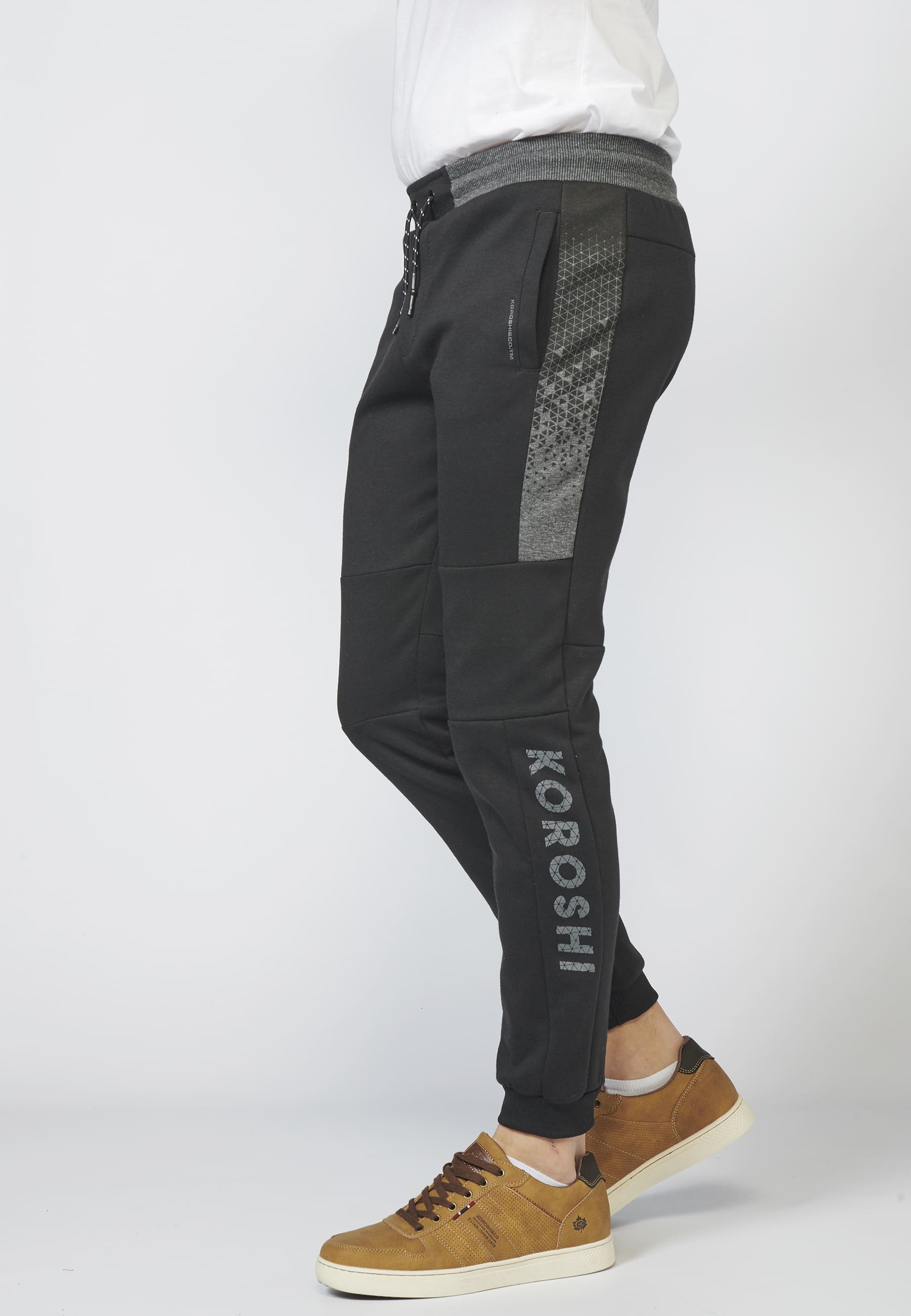 Pantalón largo deportivo jogger interlock con cintura elástica ajustable con cordón para hombre