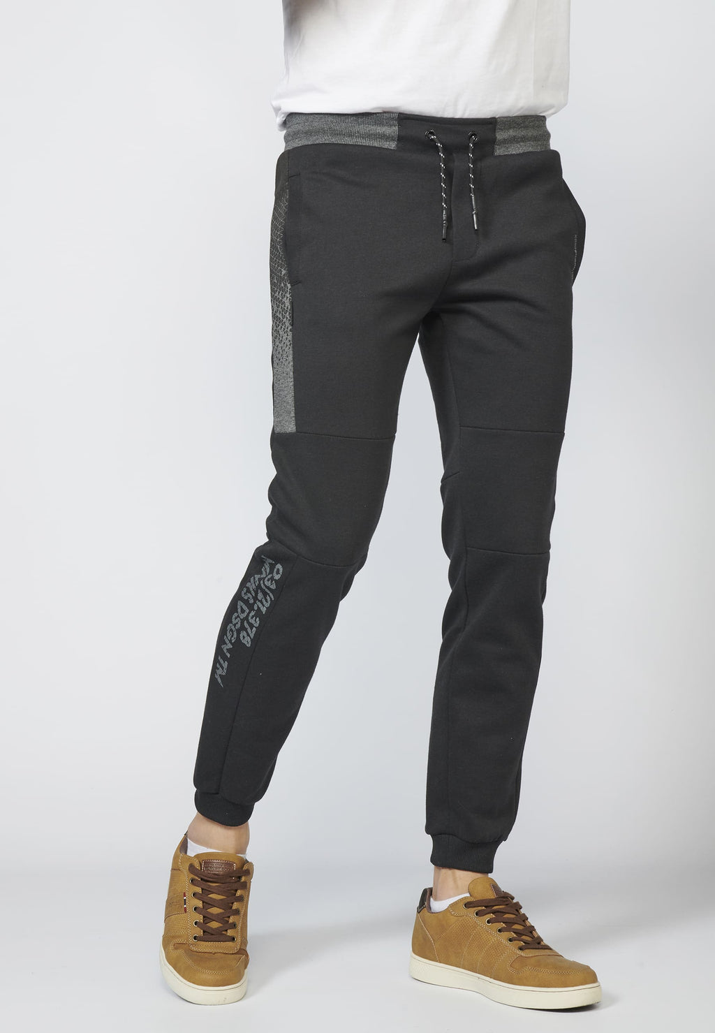Pantalón largo deportivo jogger interlock con cintura elástica ajustable con cordón para hombre