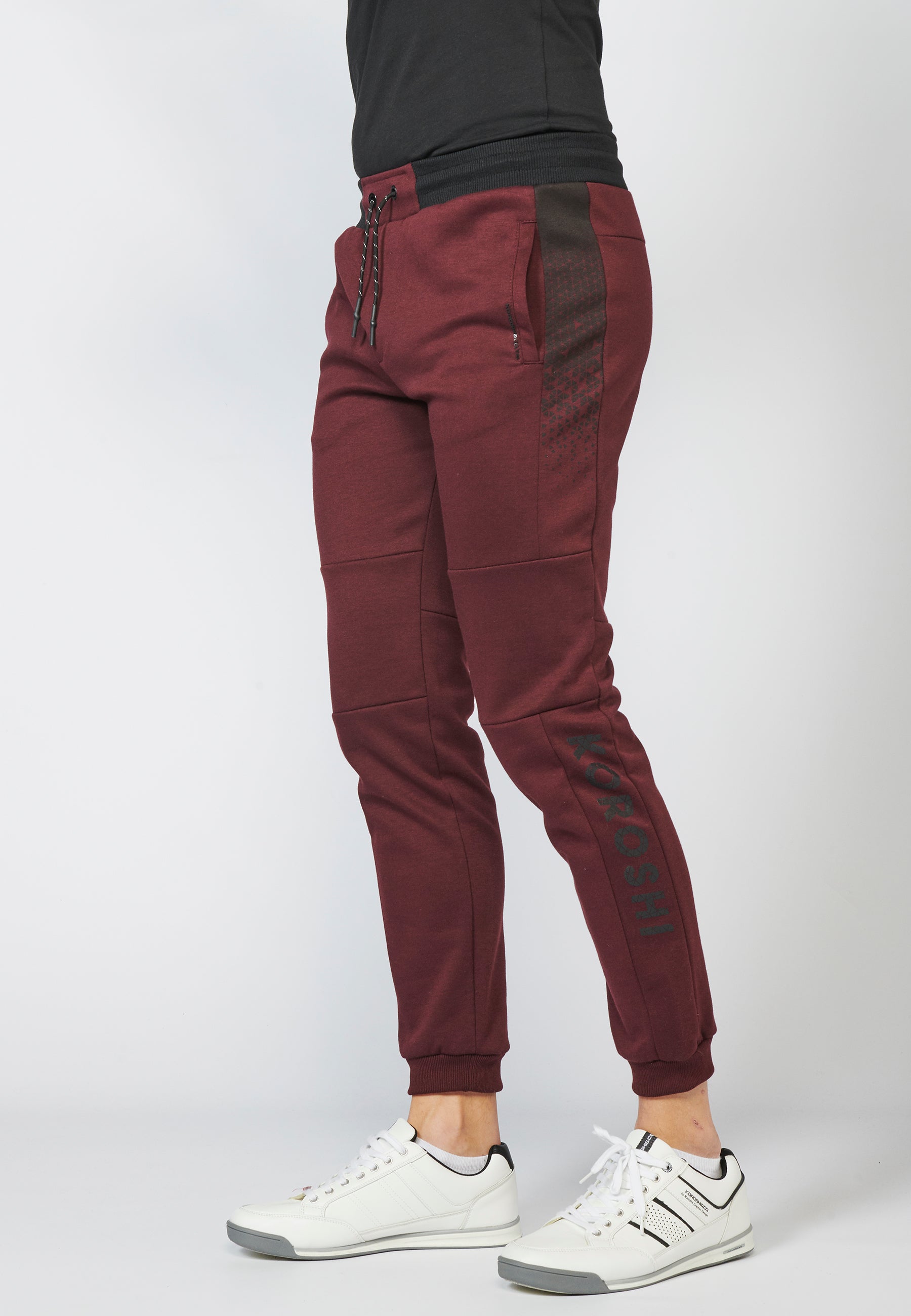 Pantalón largo deportivo jogger interlock con cintura elástica ajustable con cordón para hombre