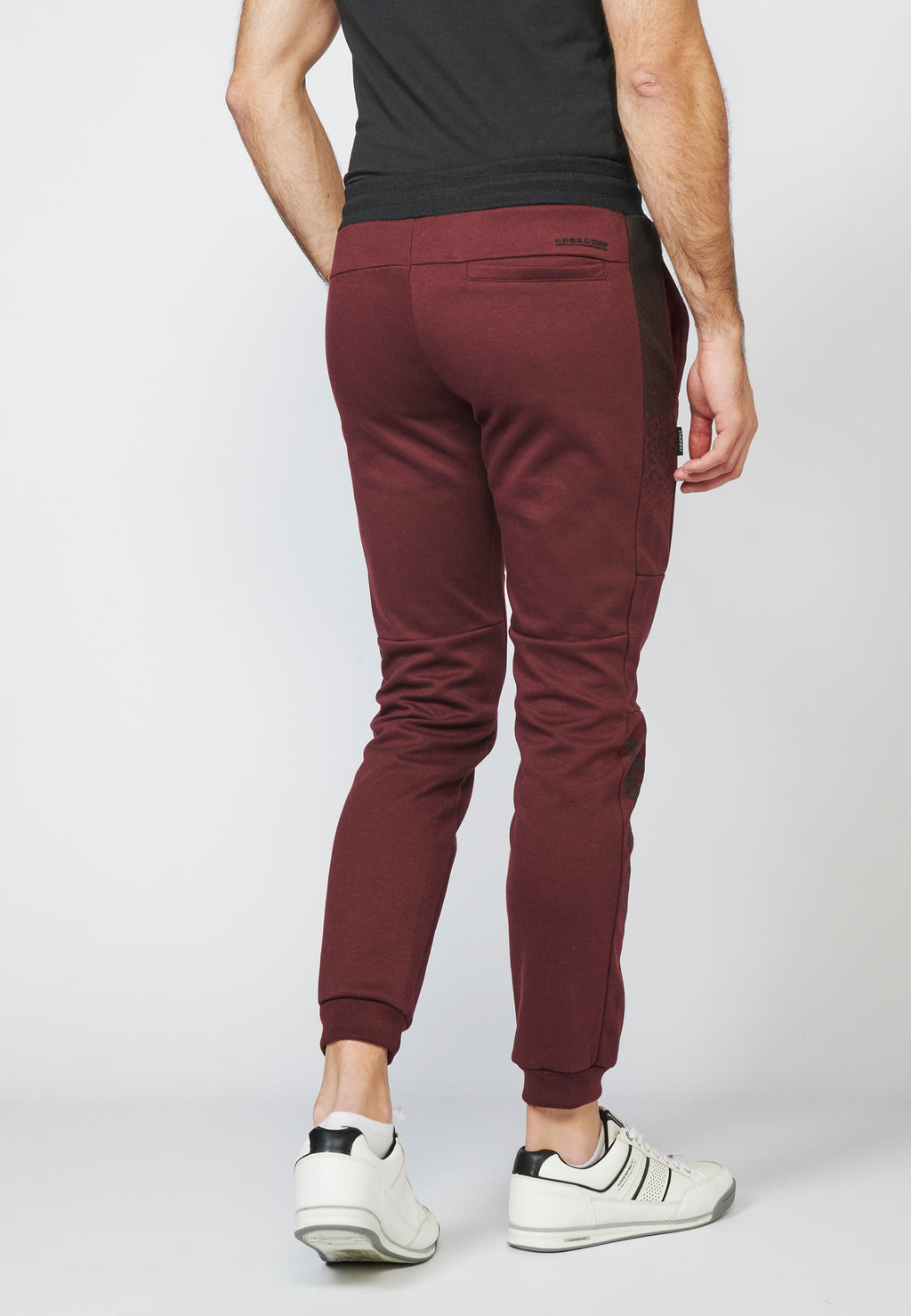 Pantalón largo deportivo jogger interlock con cintura elástica ajustable con cordón para hombre