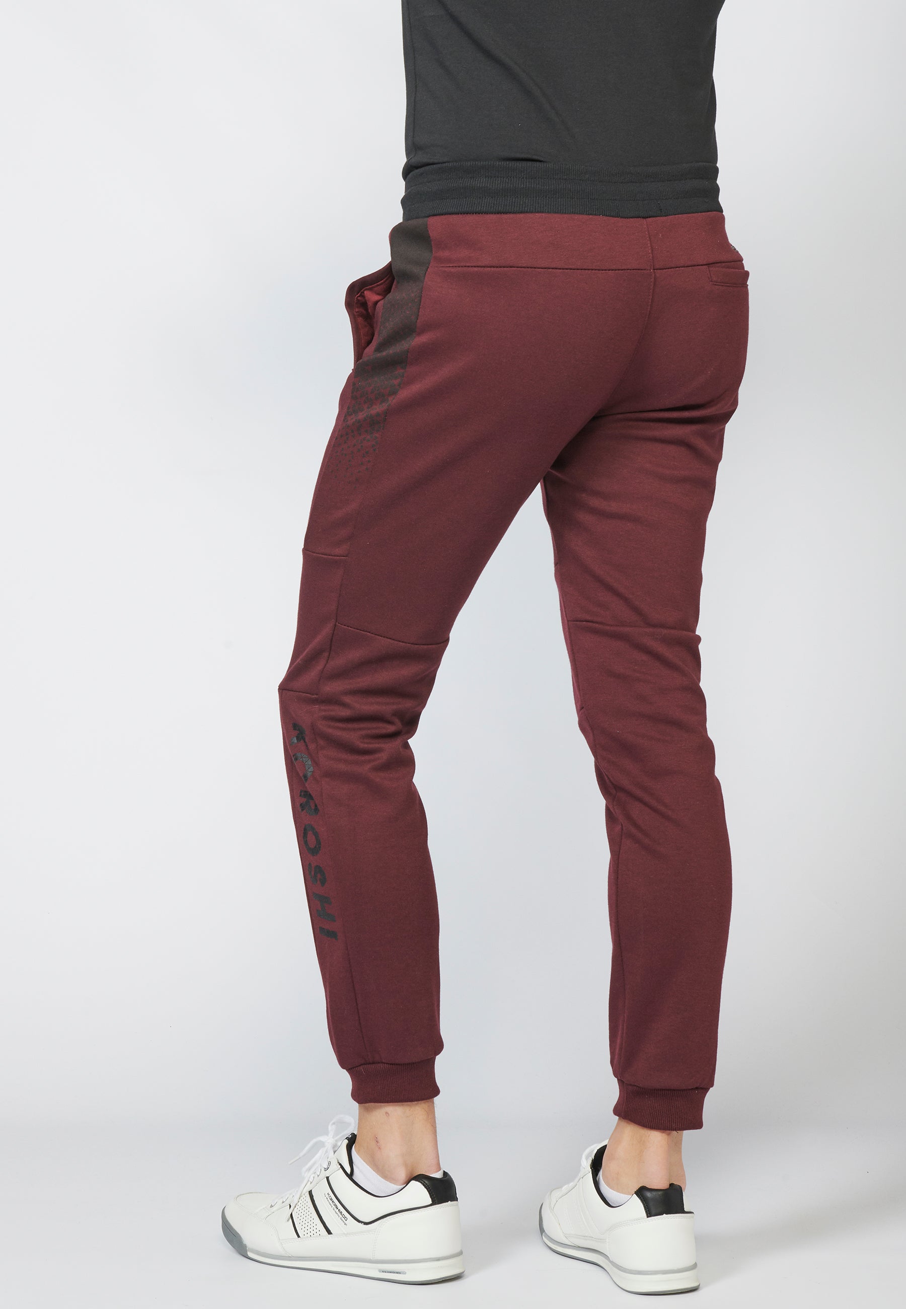 Pantalón largo deportivo jogger interlock con cintura elástica ajustable con cordón para hombre