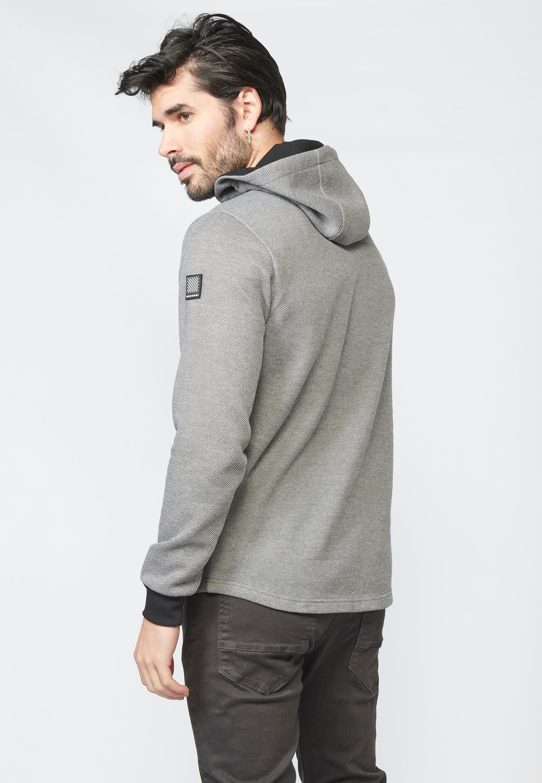 Sudadera felpa con estructura y capucha con botones y cremallera para hombre
