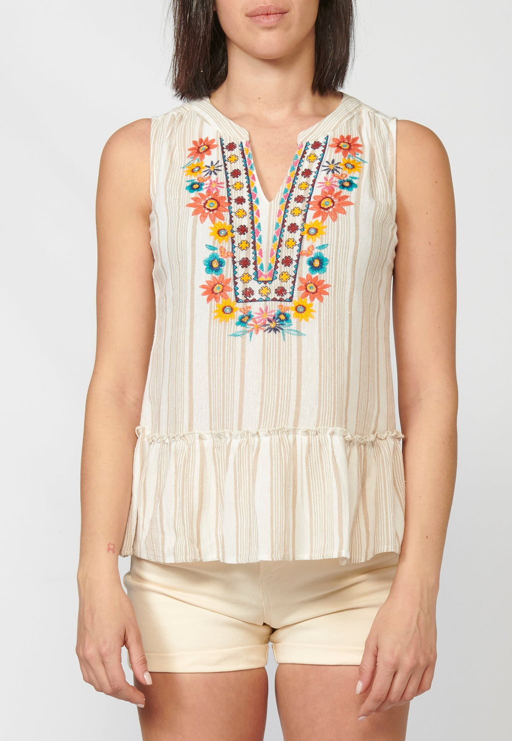 Blusa fluida sin mangas escote pico bordada de algodón para mujer