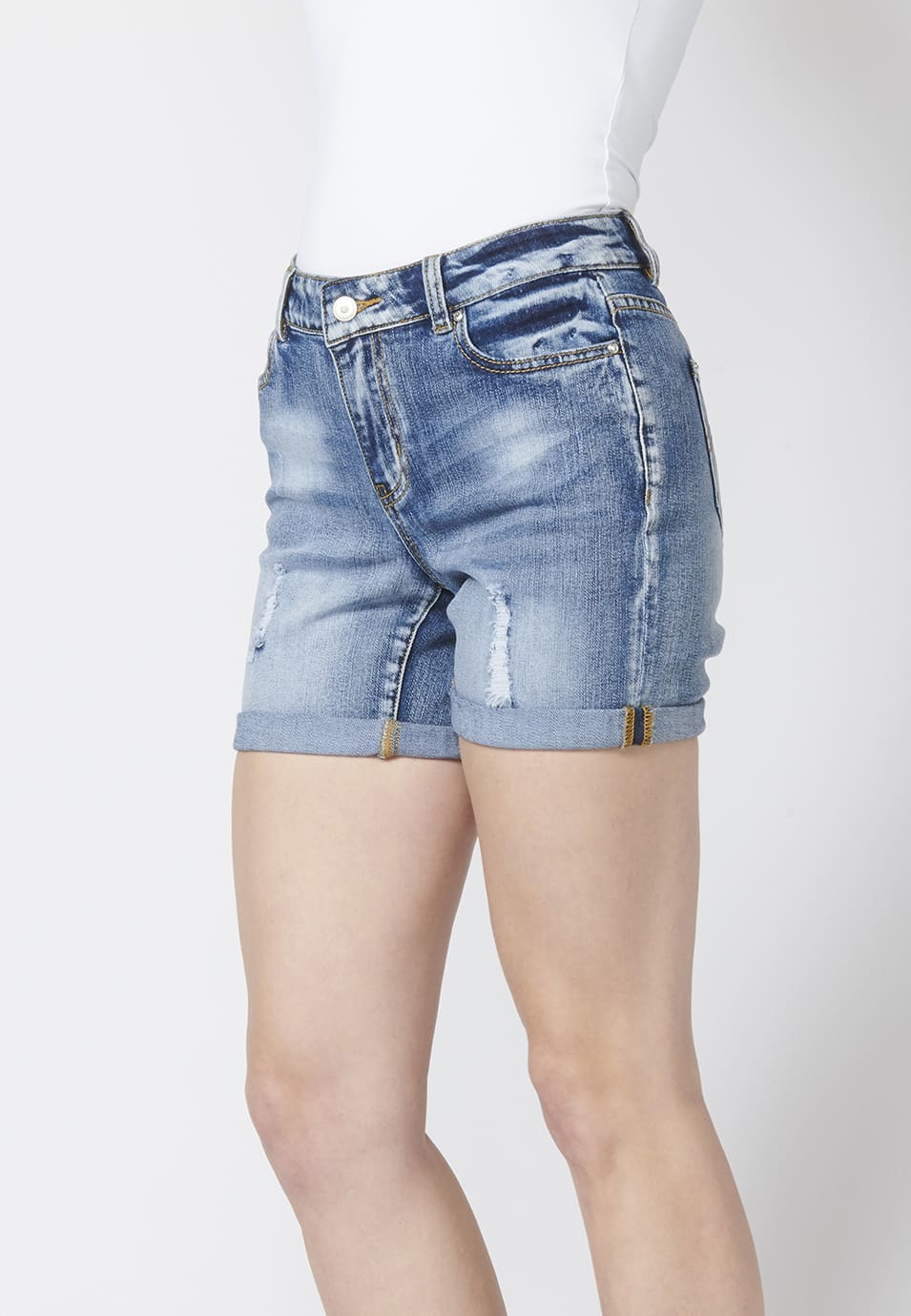 Pantalón corto mujer denim short tejano elástico encima rodilla detalles con rotos | moda urbana