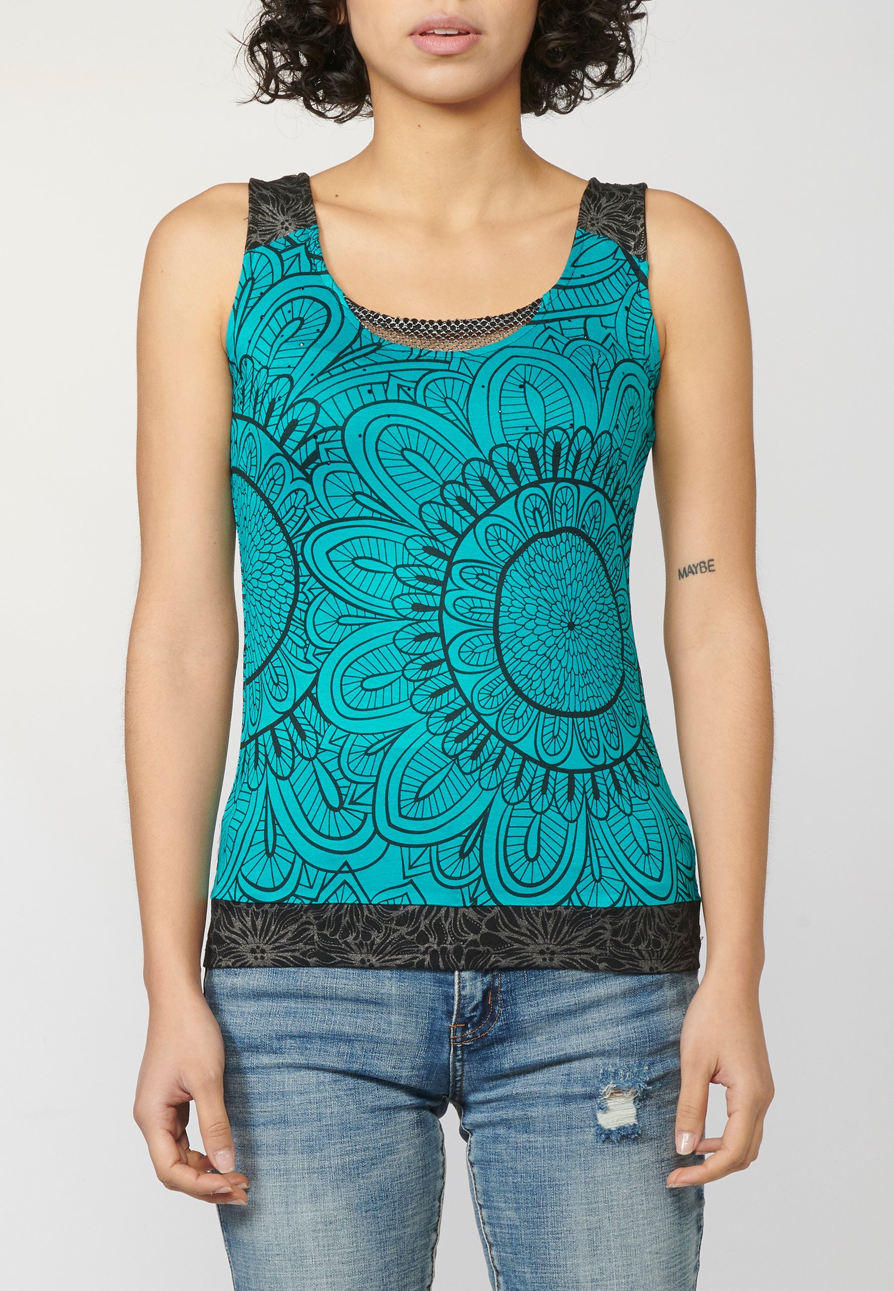 Top sin mangas y escote redondo con estampado floral y detalle a contraste en delantero y espalda | estilo y comodidad
