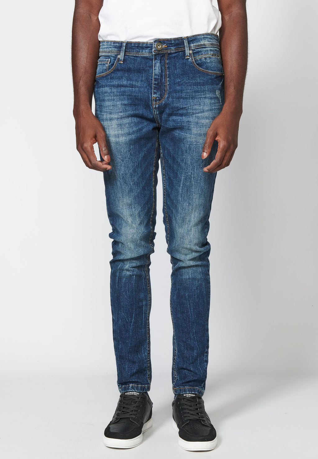 Pantalón largo jeans super skinny con detalles en las rodillas para hombre