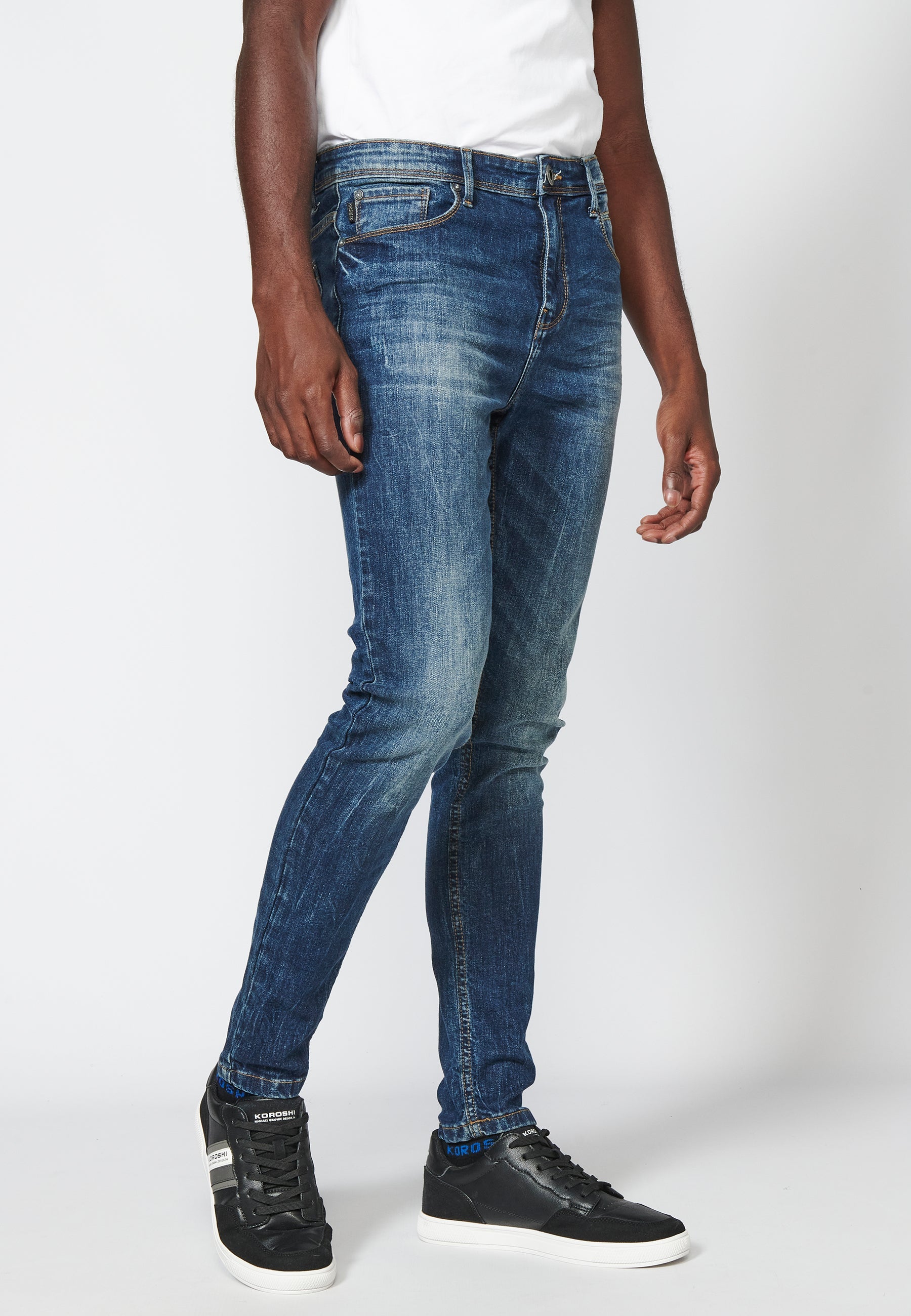 Pantalón largo jeans super skinny con detalles en las rodillas para hombre