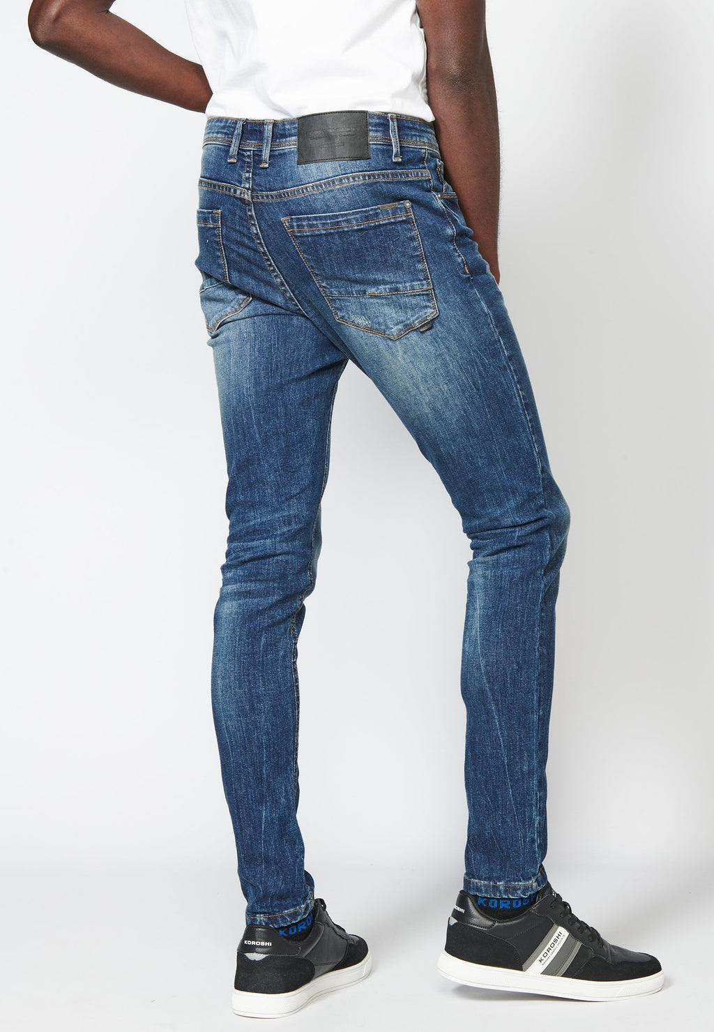Pantalón largo jeans super skinny con detalles en las rodillas para hombre