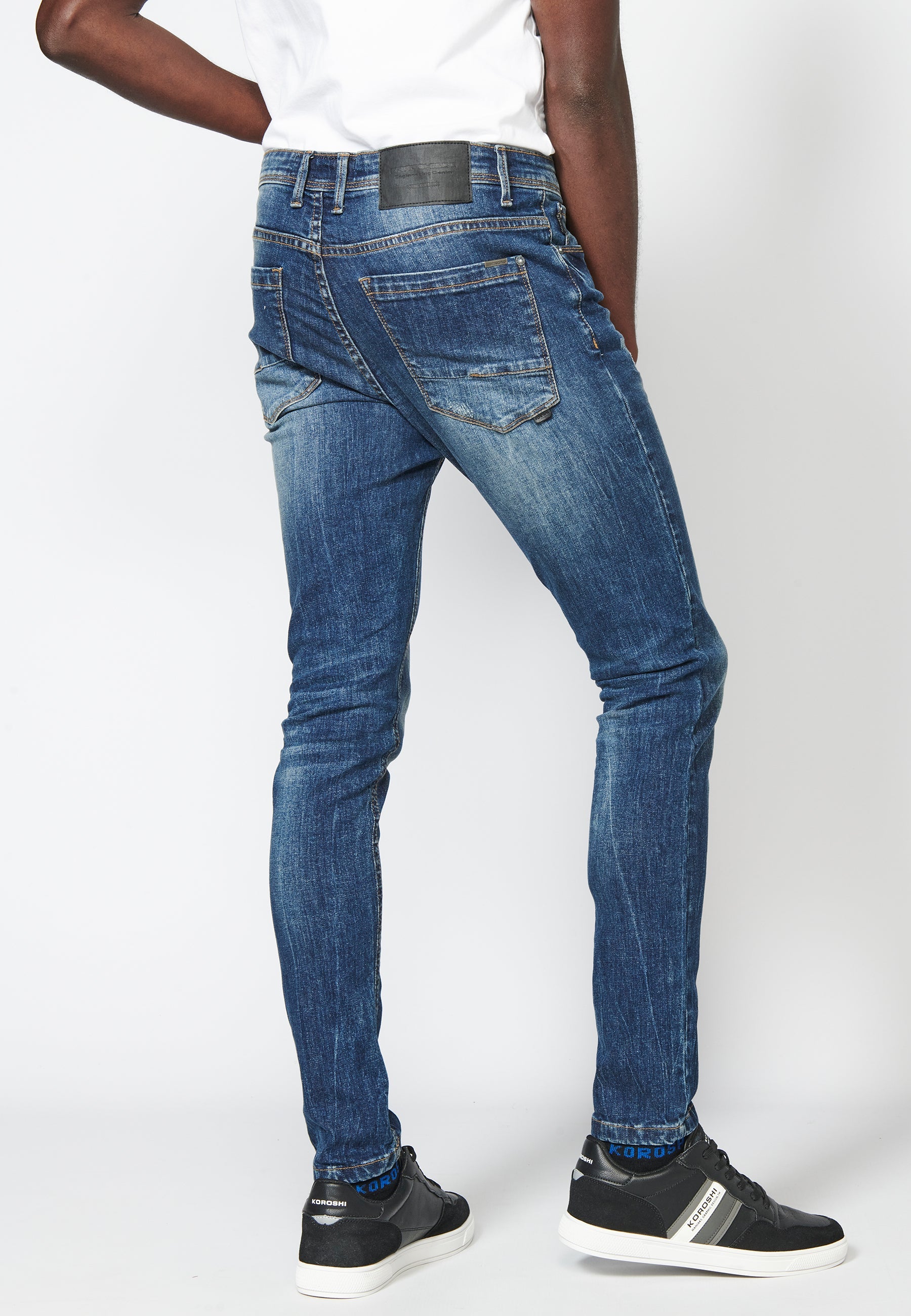 Pantalón largo jeans super skinny con detalles en las rodillas para hombre