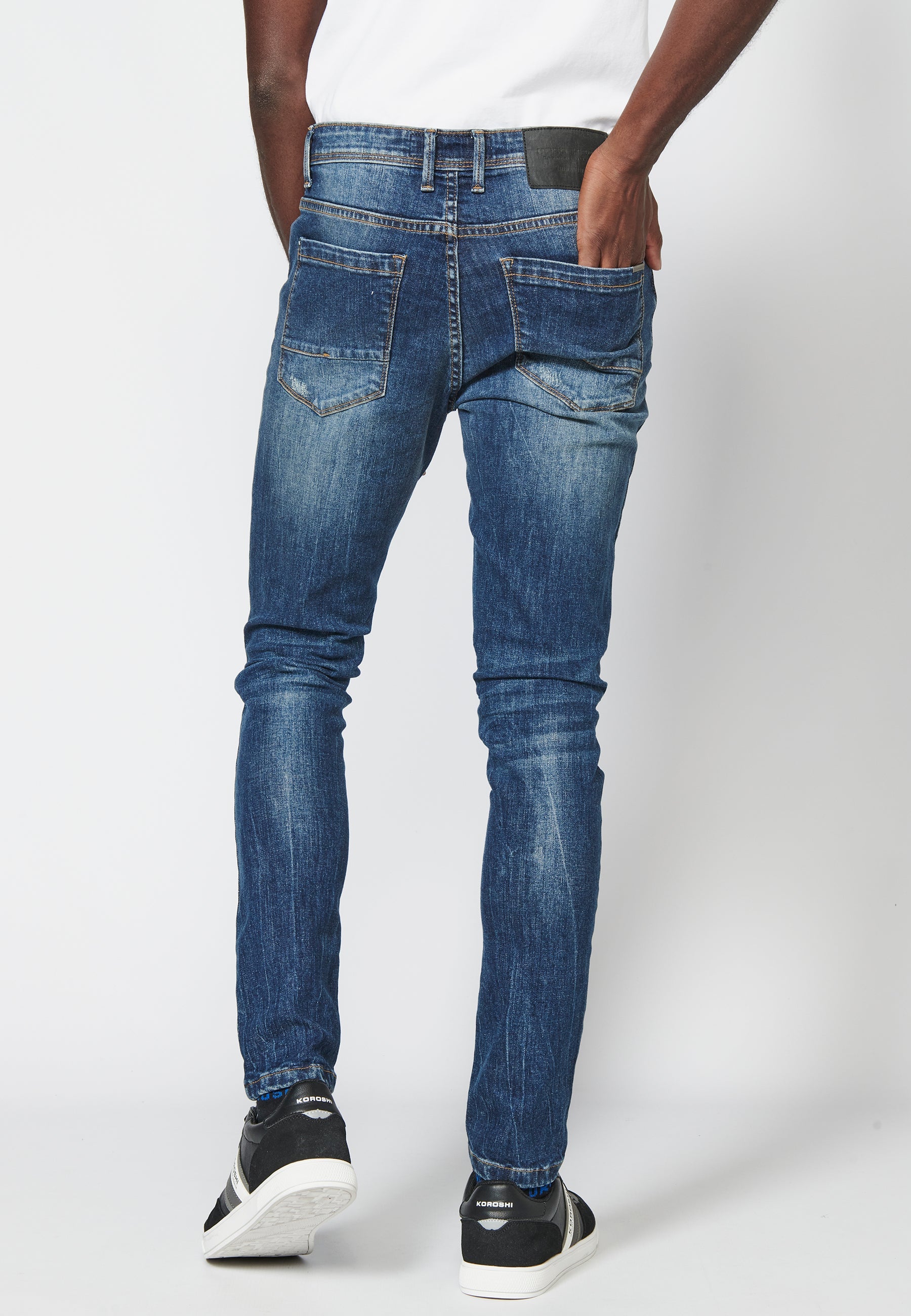 Pantalón largo jeans super skinny con detalles en las rodillas para hombre