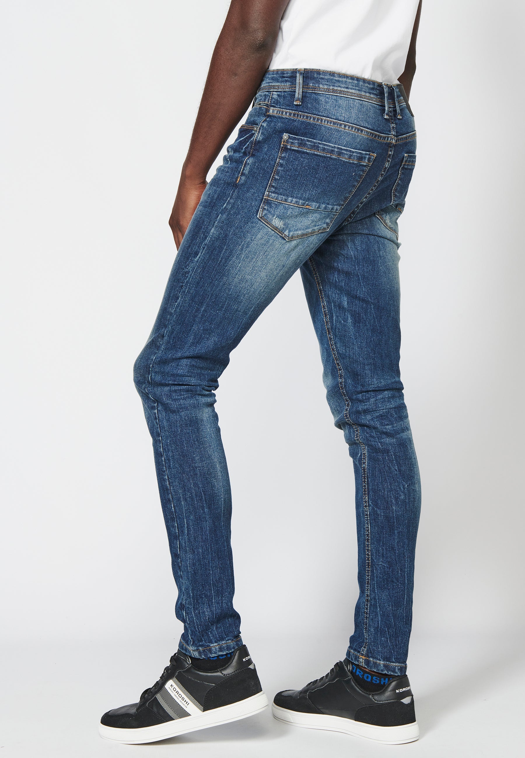Pantalón largo jeans super skinny con detalles en las rodillas para hombre