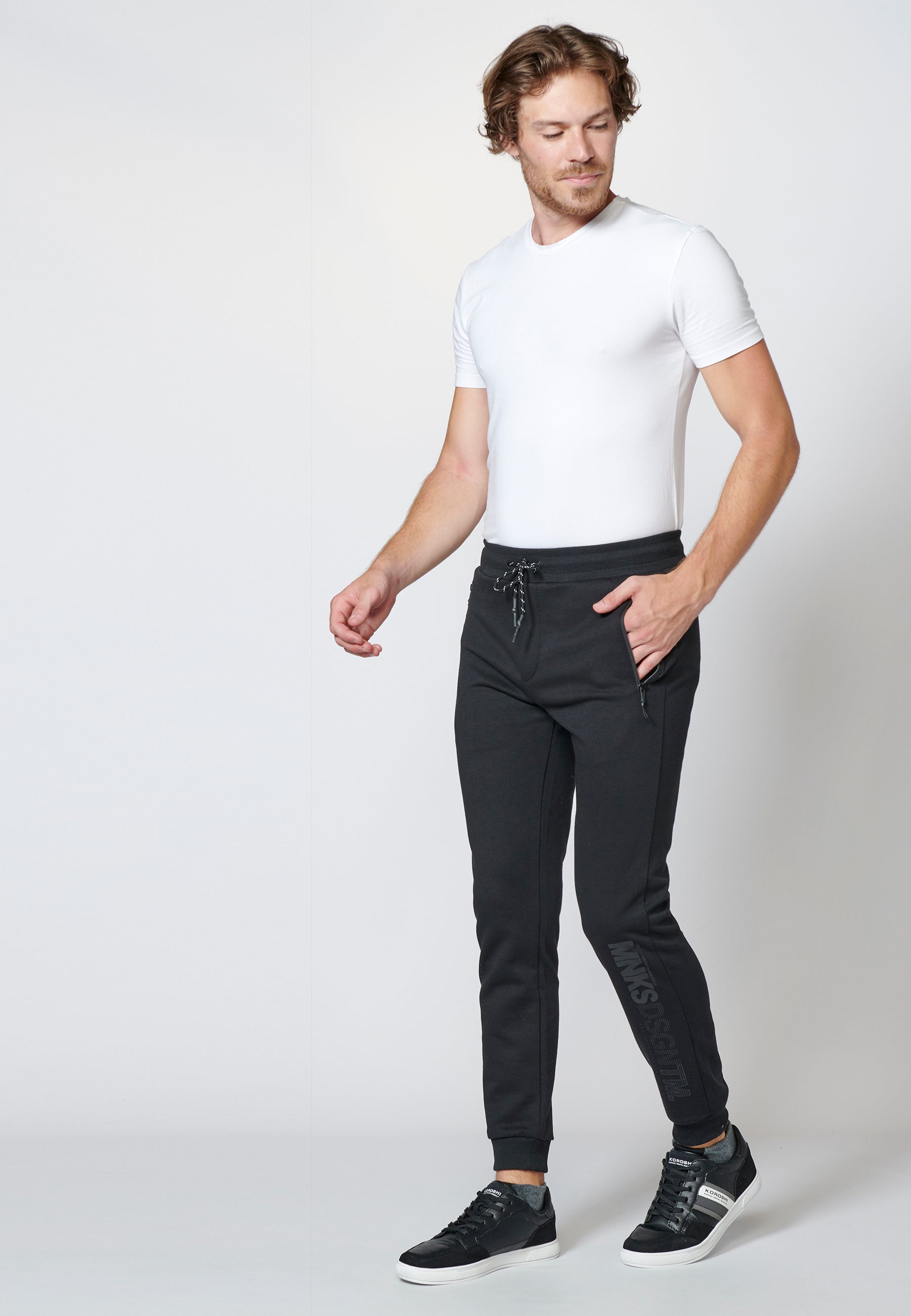 Pantalón largo deportivo de felpa tipo jogger acabados en rib para hombre