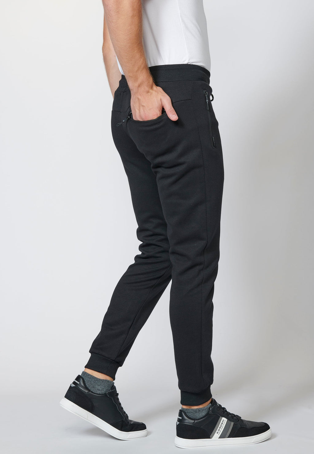 Pantalón largo deportivo de felpa tipo jogger acabados en rib para hombre