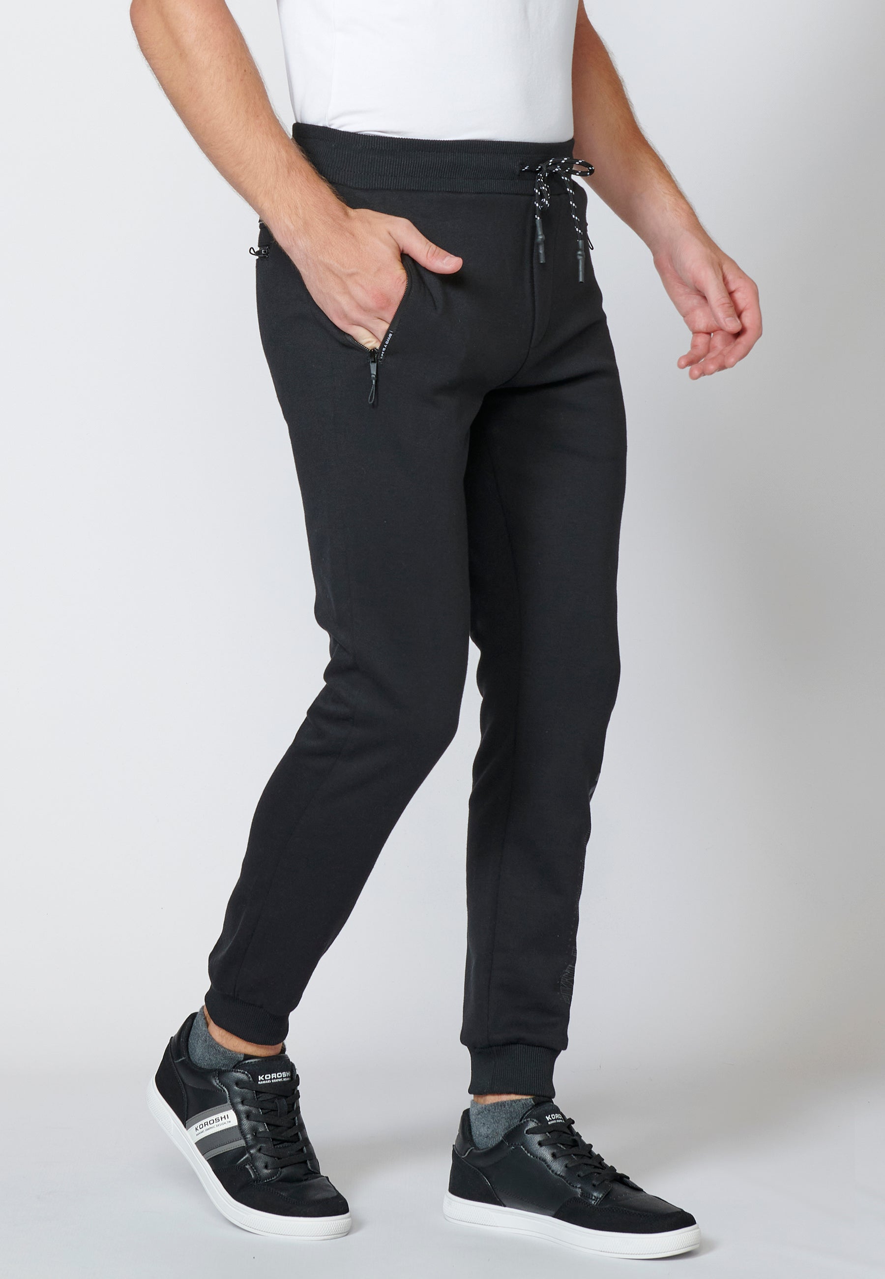 Pantalón largo deportivo de felpa tipo jogger acabados en rib para hombre