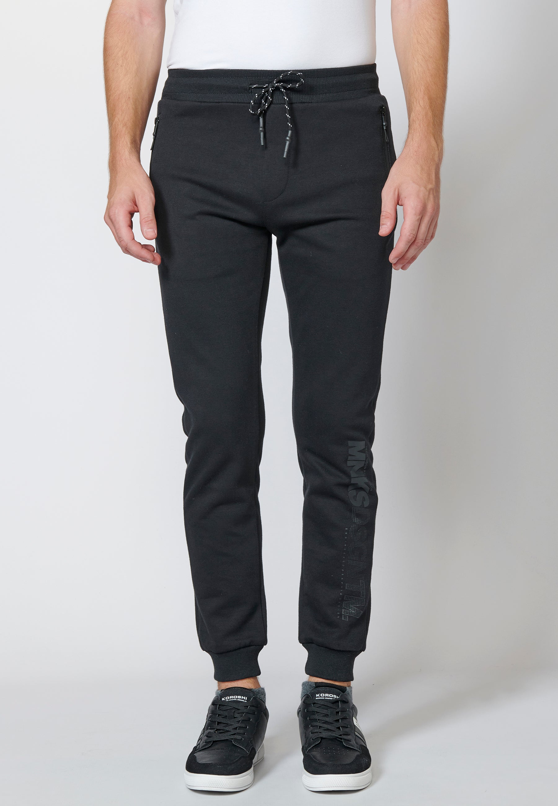 Pantalón largo deportivo de felpa tipo jogger acabados en rib para hombre