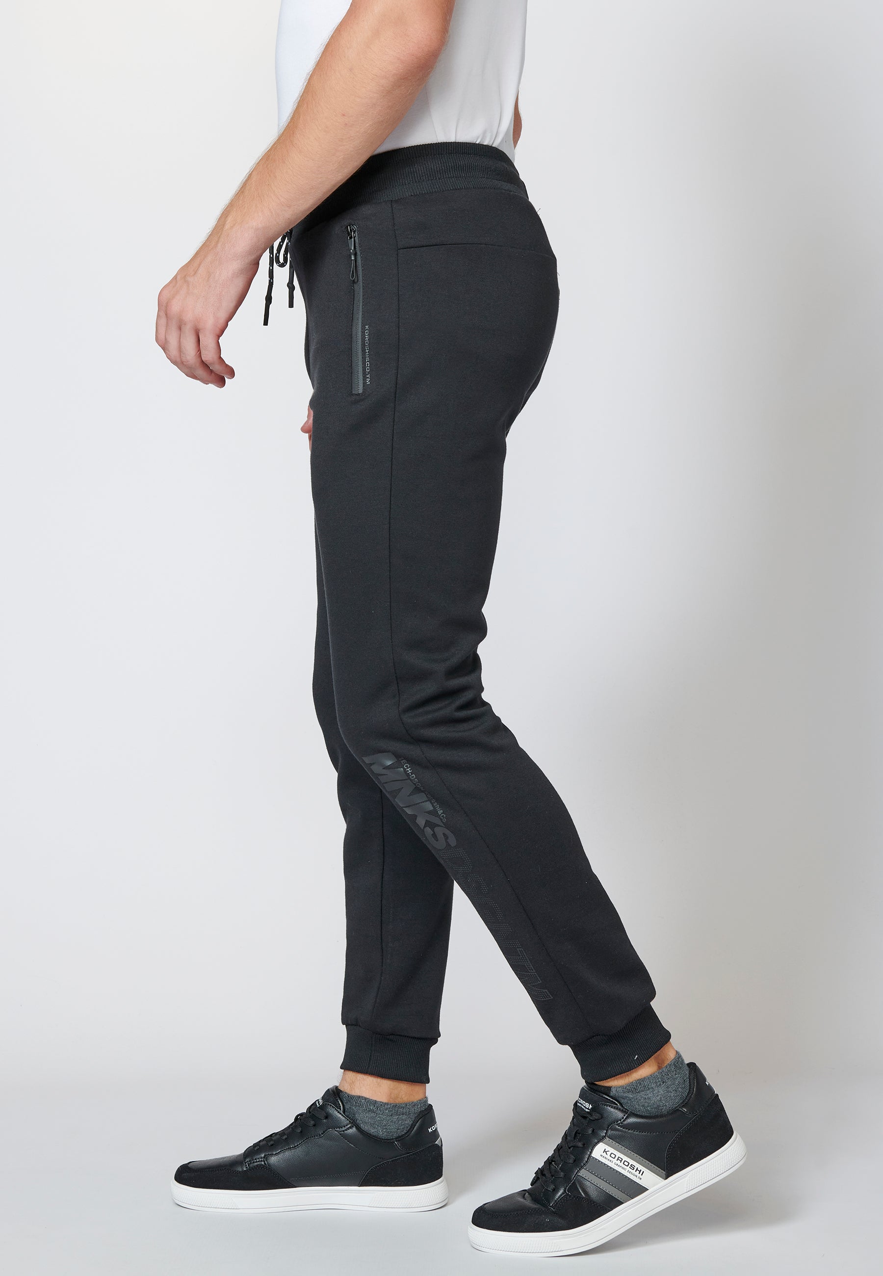 Pantalón largo deportivo de felpa tipo jogger acabados en rib para hombre