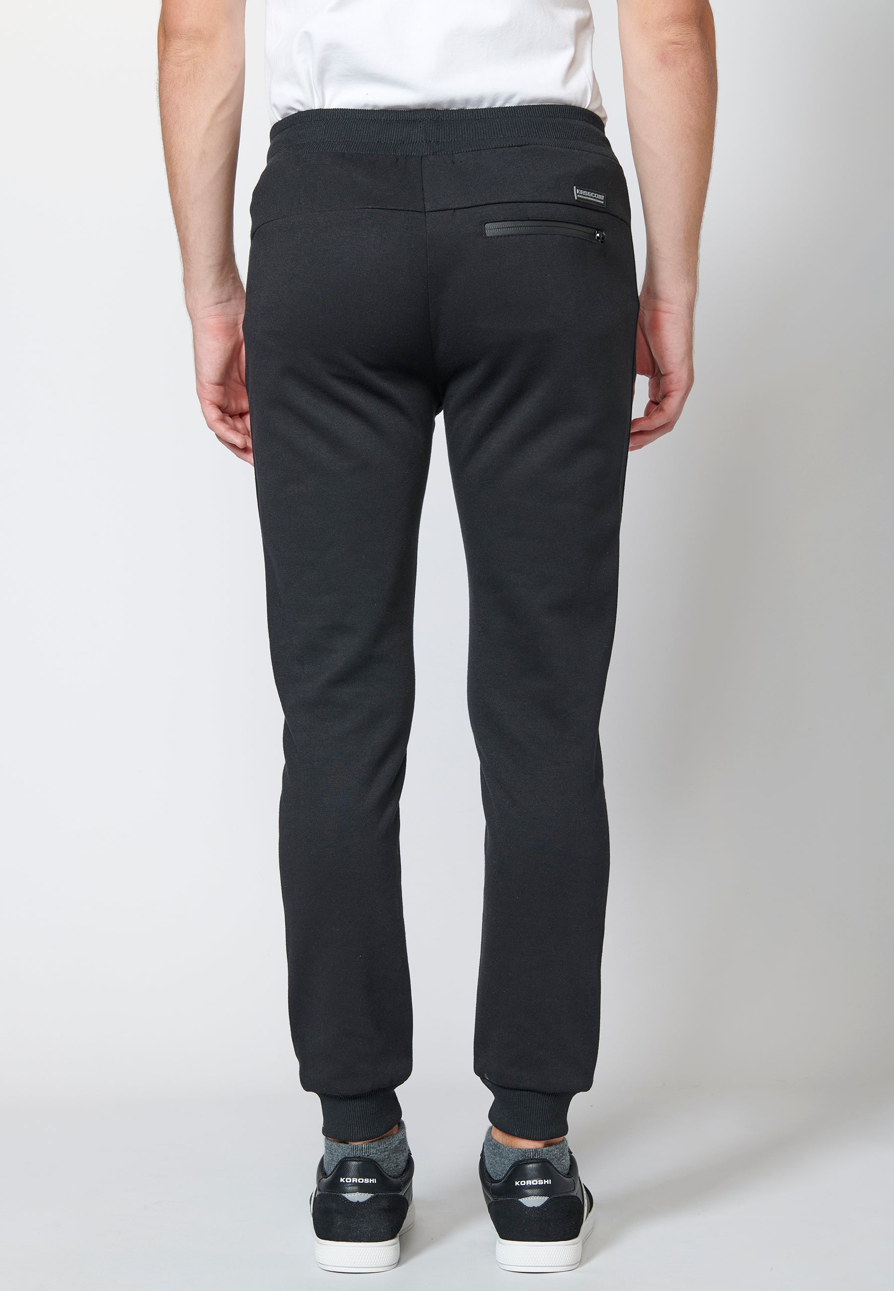Pantalón largo deportivo de felpa tipo jogger acabados en rib para hombre