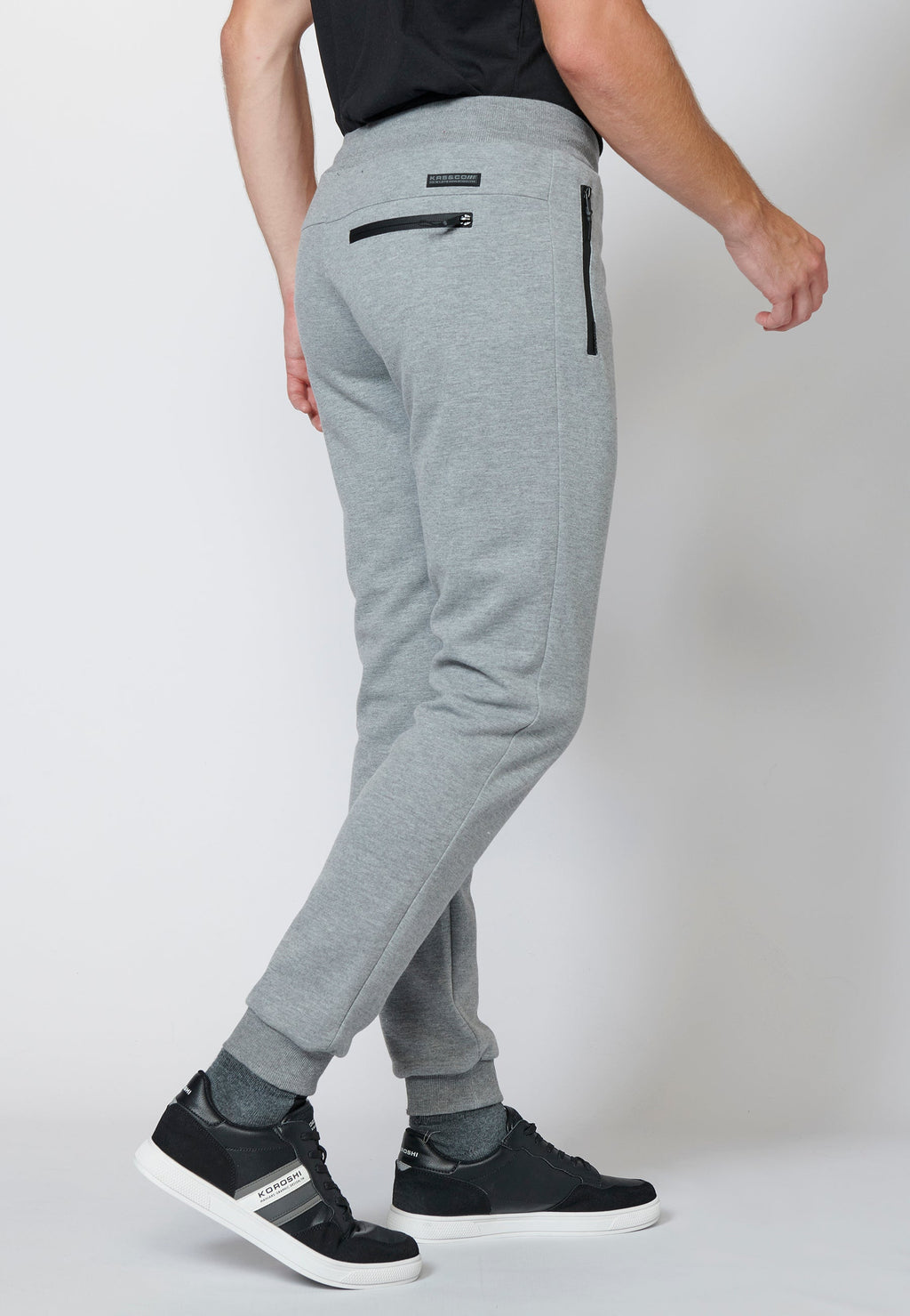 Pantalón largo deportivo de felpa tipo jogger acabados en rib para hombre