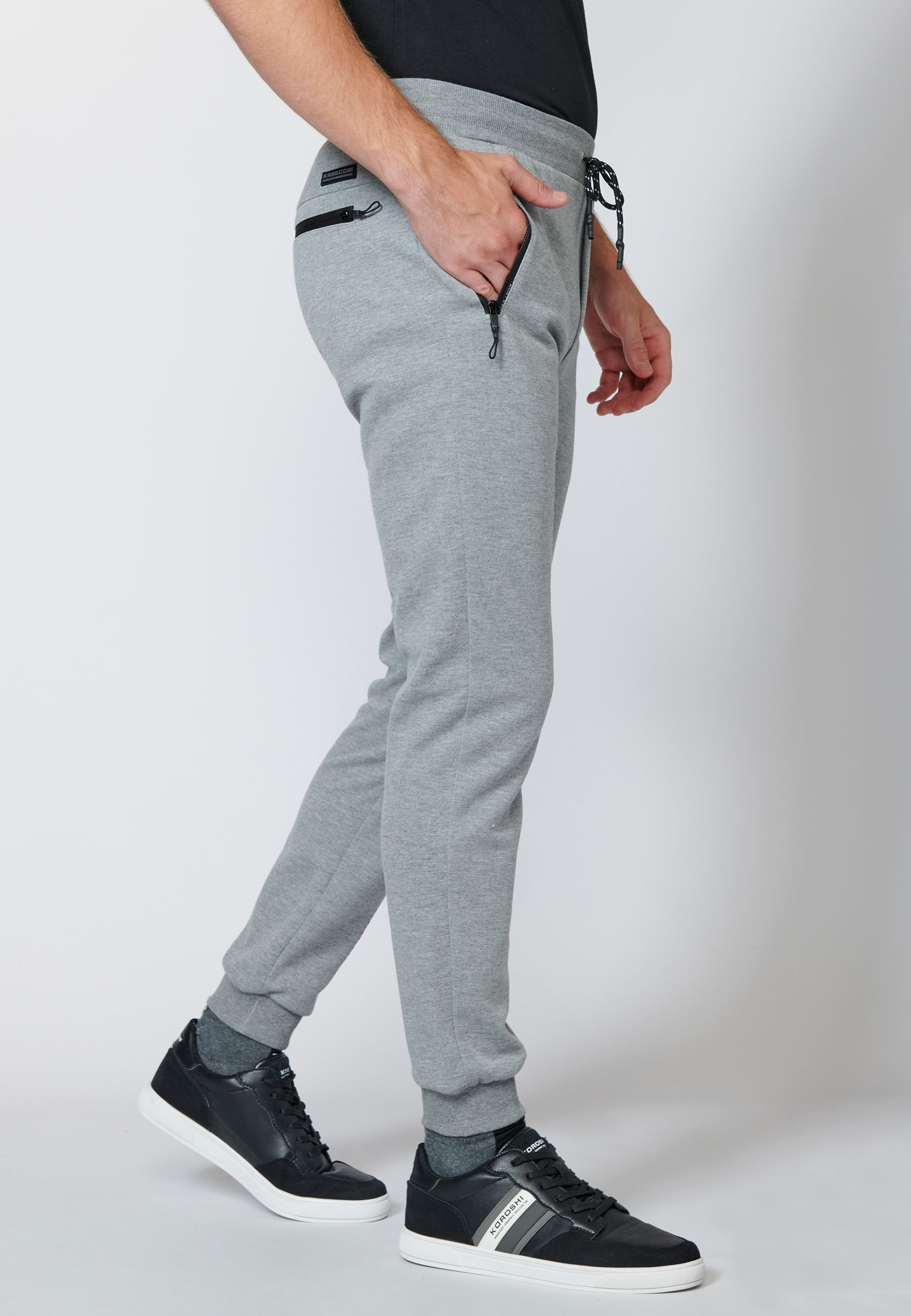 Pantalón largo deportivo de felpa tipo jogger acabados en rib para hombre
