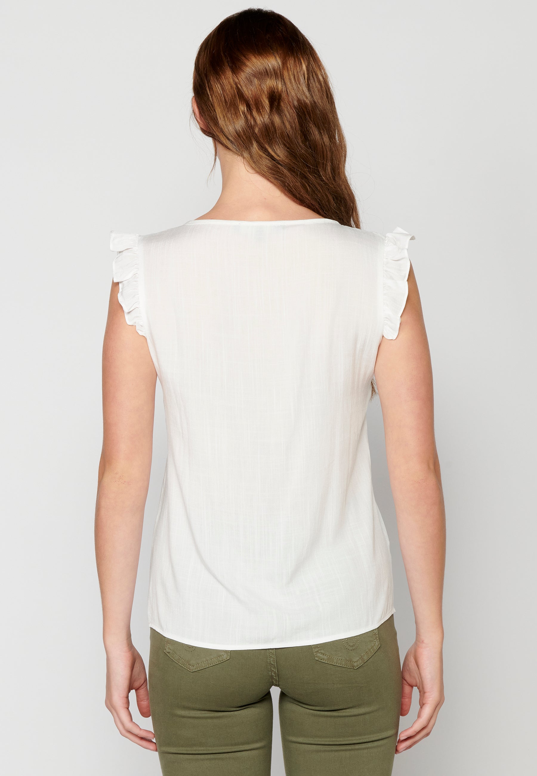 Blusa sin mangas con bordado floral para mujer | moda actual