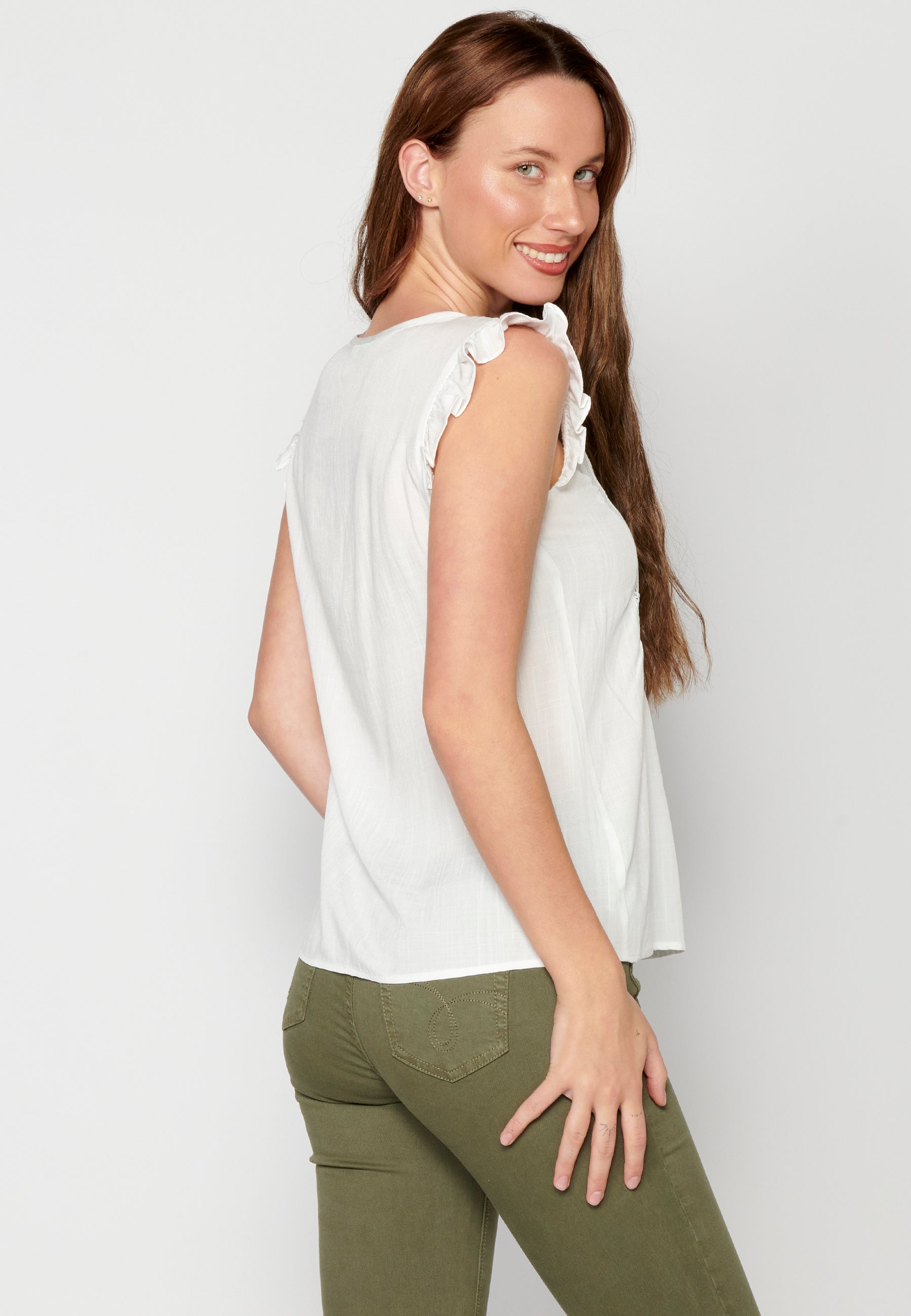 Blusa sin mangas con bordado floral para mujer | moda actual