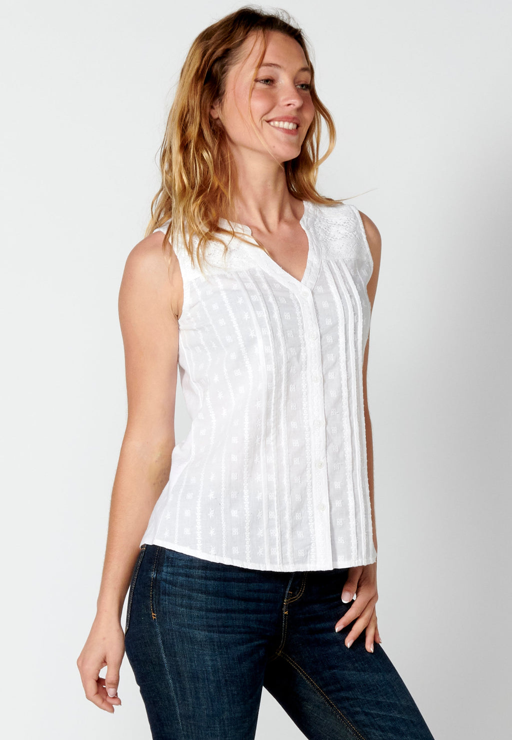 Blusa sin mangas de algodón con detalles bordados para mujer | moda actual