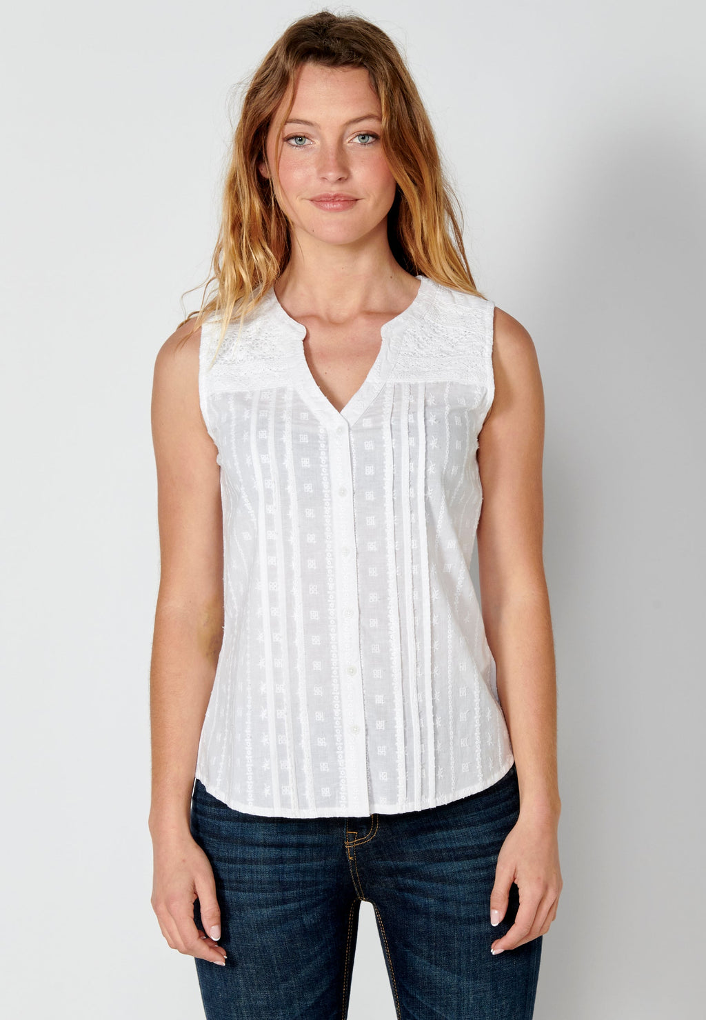 Blusa sin mangas de algodón con detalles bordados para mujer | moda actual