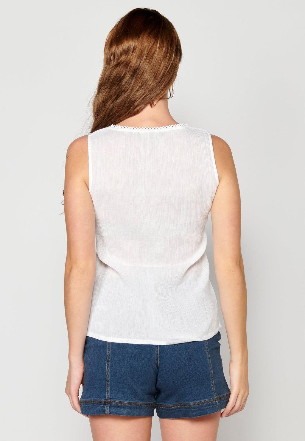 Blusa sin mangas de algodón para mujer | moda actual