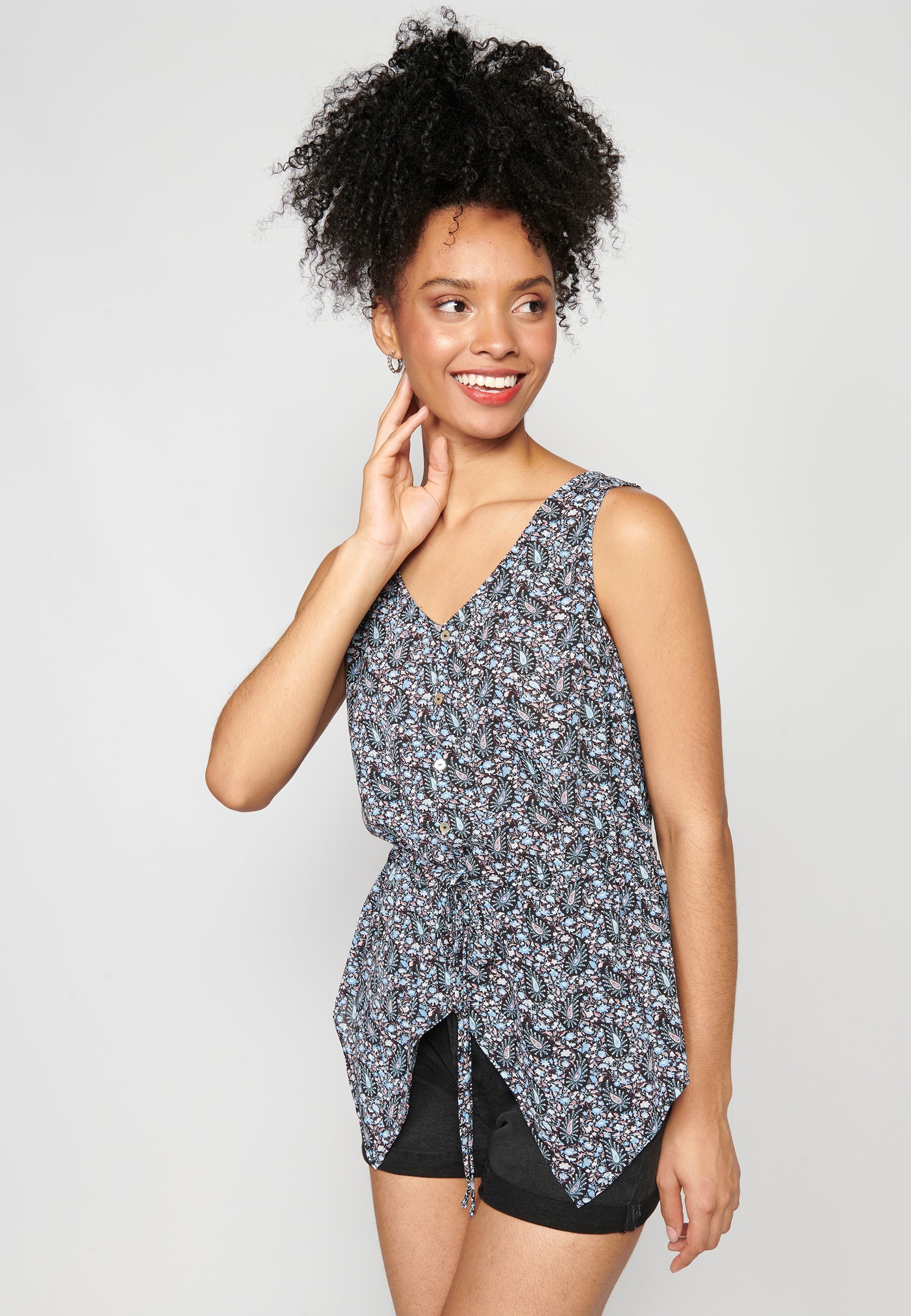 Blusa sin mangas fluida escote de pico para mujer | moda actual