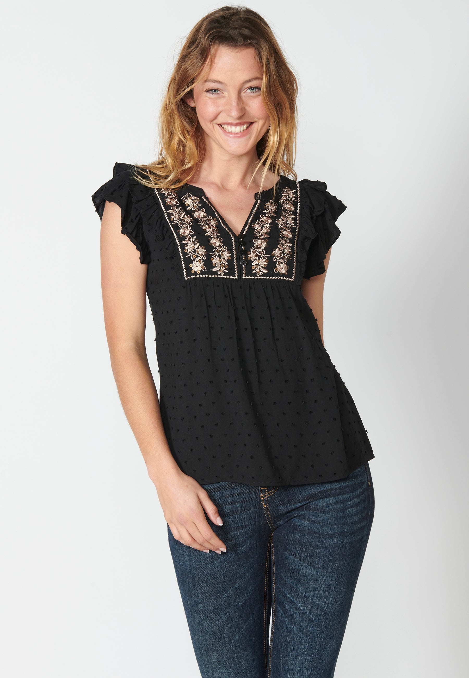 Blusa fluida sin mangas con detalle floral para mujer | moda actual