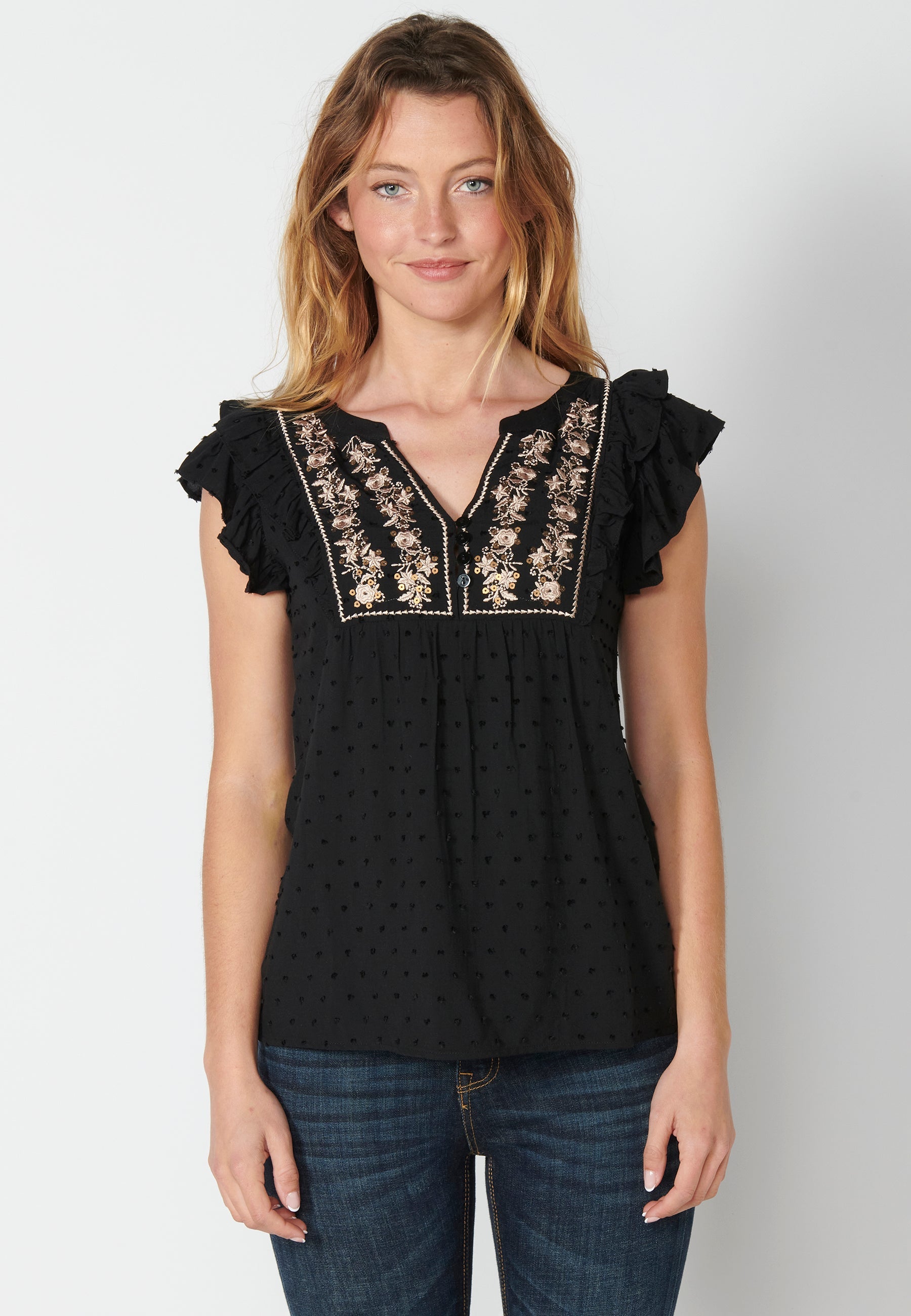 Blusa fluida sin mangas con detalle floral para mujer | moda actual
