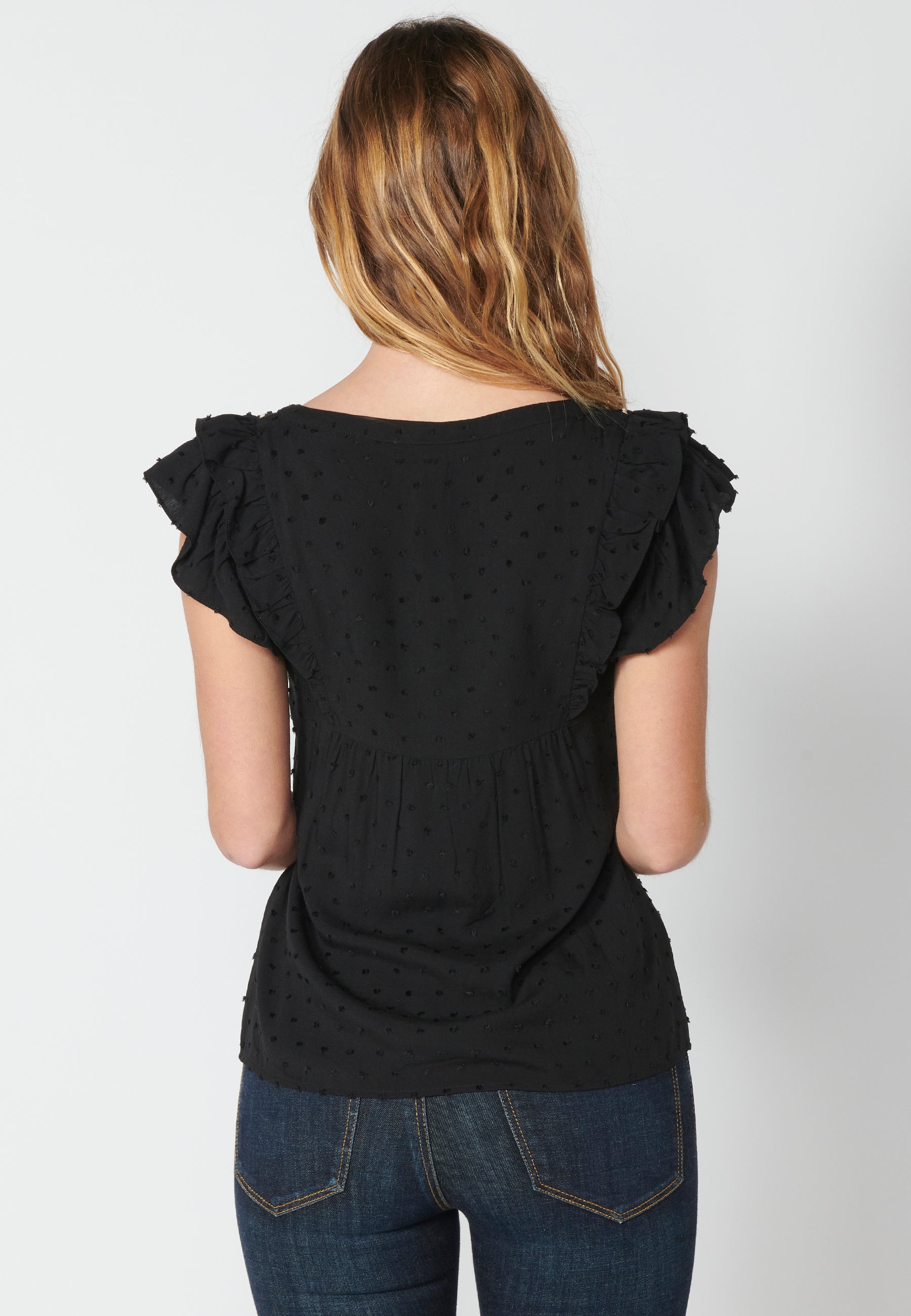 Blusa fluida sin mangas con detalle floral para mujer | moda actual