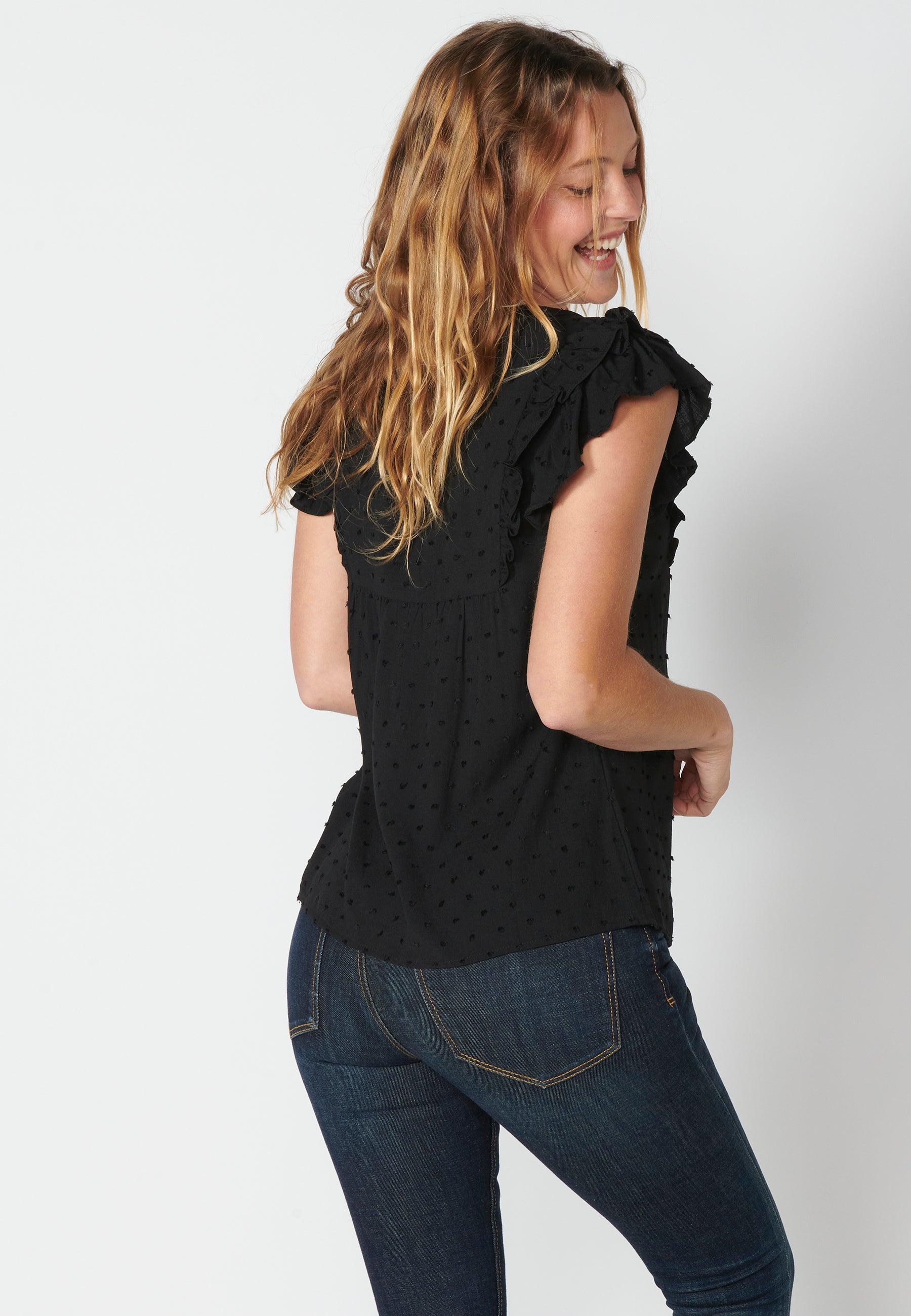 Blusa fluida sin mangas con detalle floral para mujer | moda actual