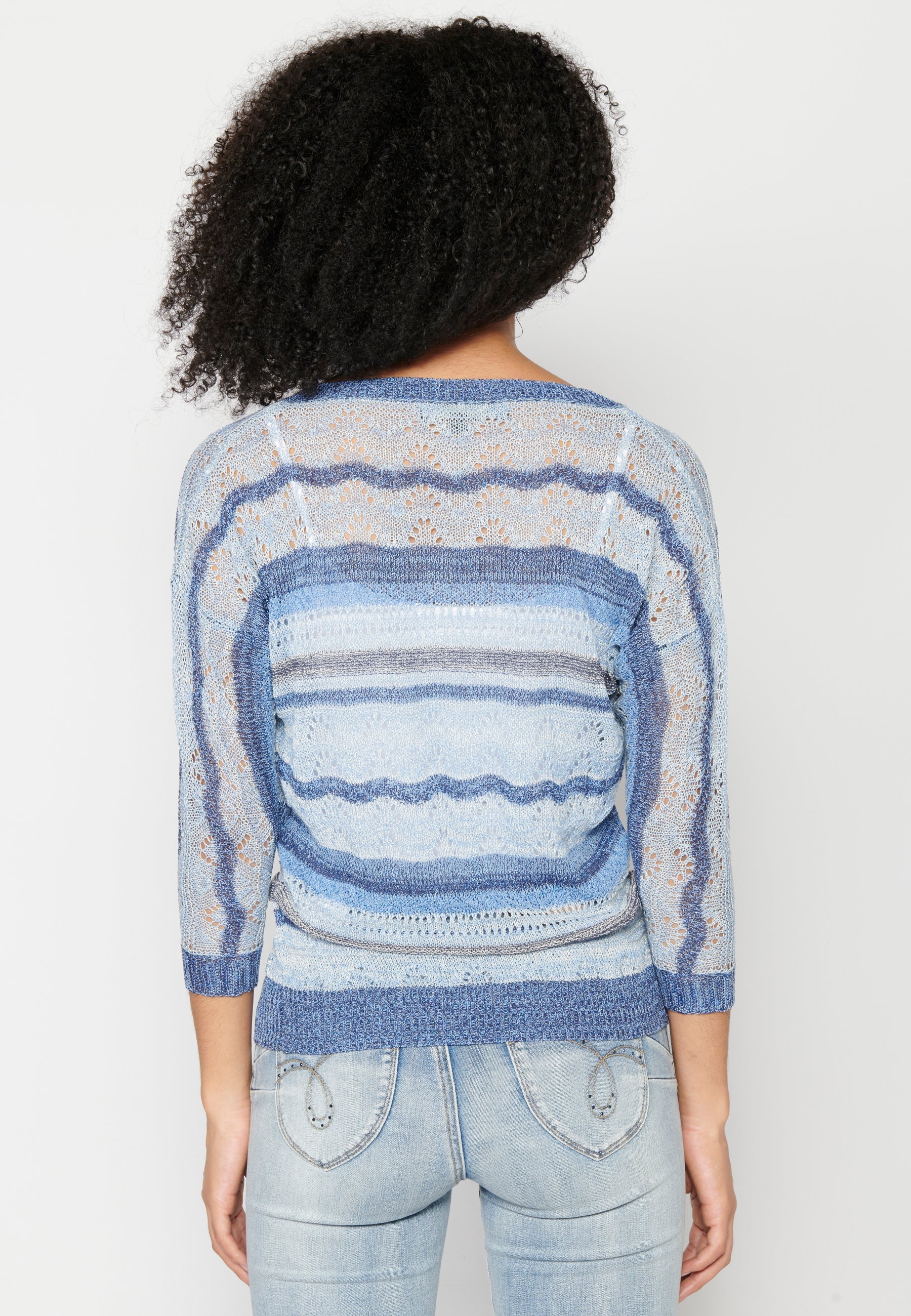 Jersey de punto con calados para mujer | moda actual