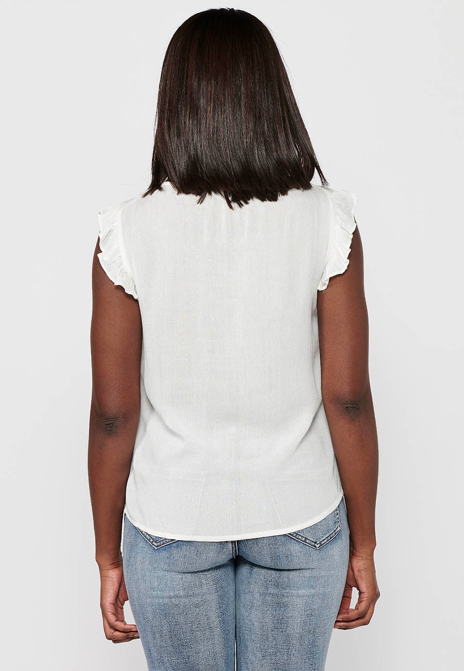 Blusa sin mangas con mini volante en los hombros y en la parte delantera bordado floral para mujer | moda actual