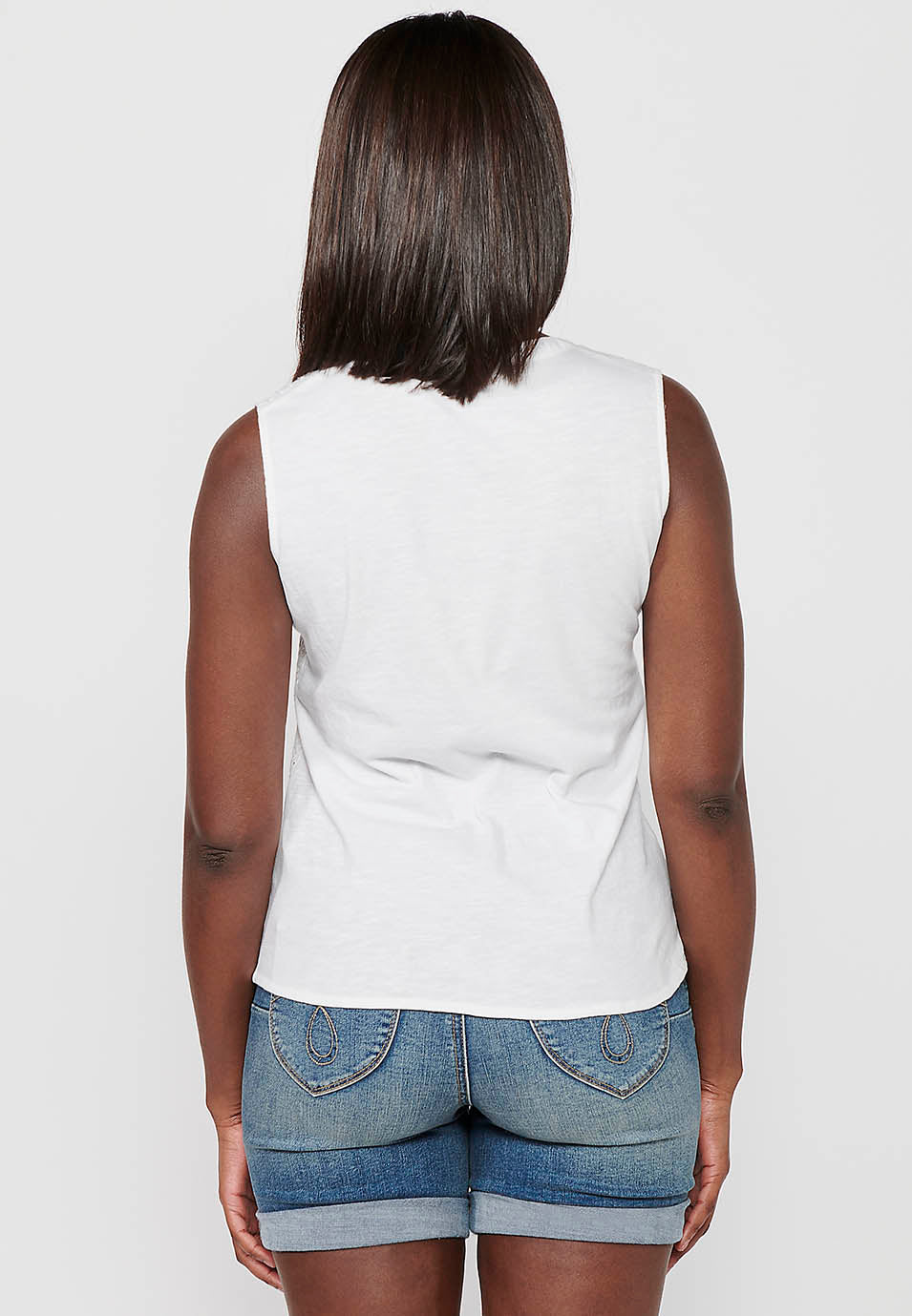 Blusa sin mangas con cuello camisero y blonda floral para mujer | moda actual