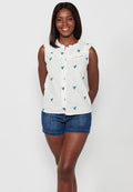 Blusa sin mangas de algodón de mini volante en los hombros con tela con bordados florales y cuello redondo y cierre delantero con botones elásticos para mujer | moda actual