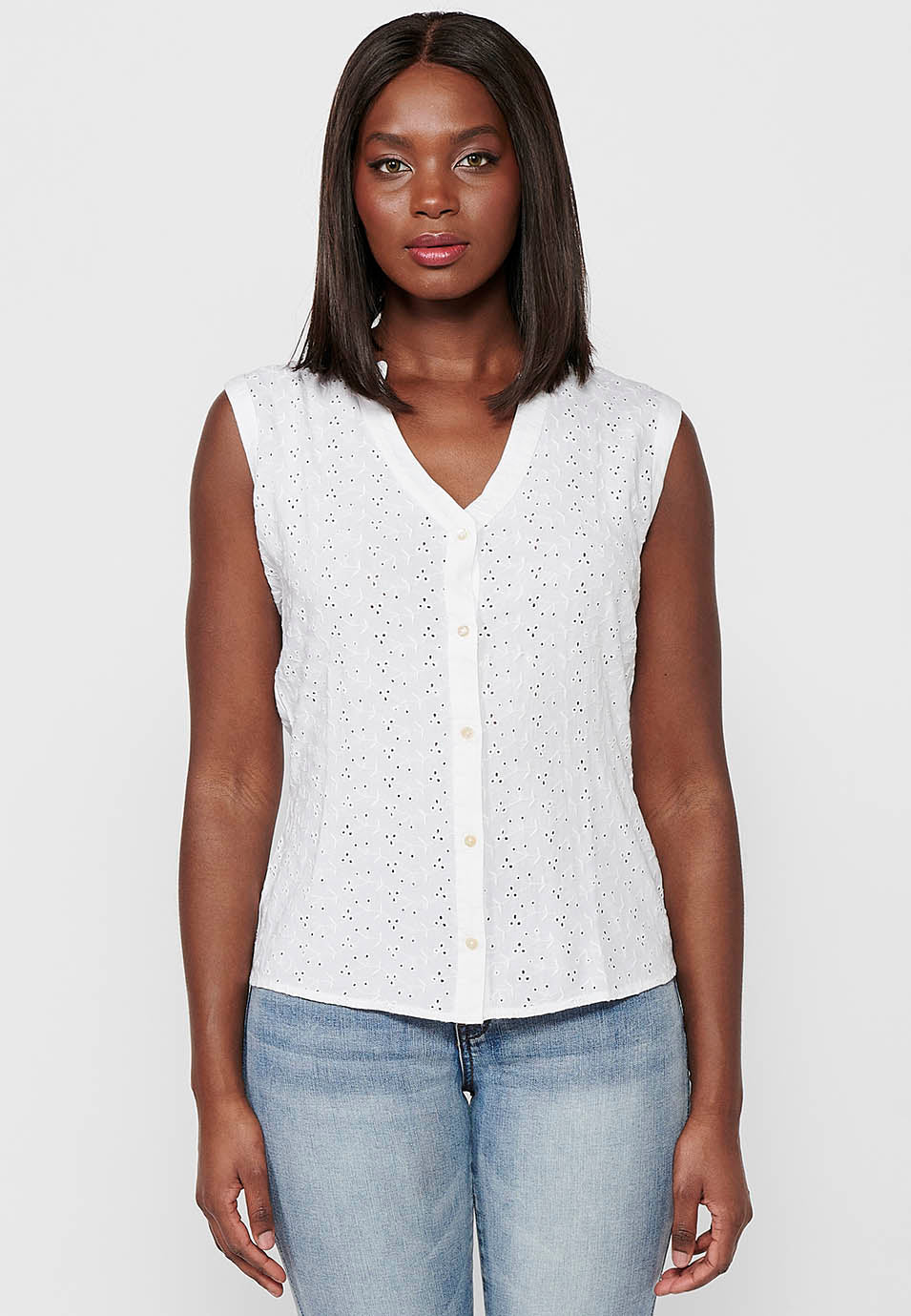 Blusa sin mangas de algodón con cierre delantero con botones para mujer | moda actual