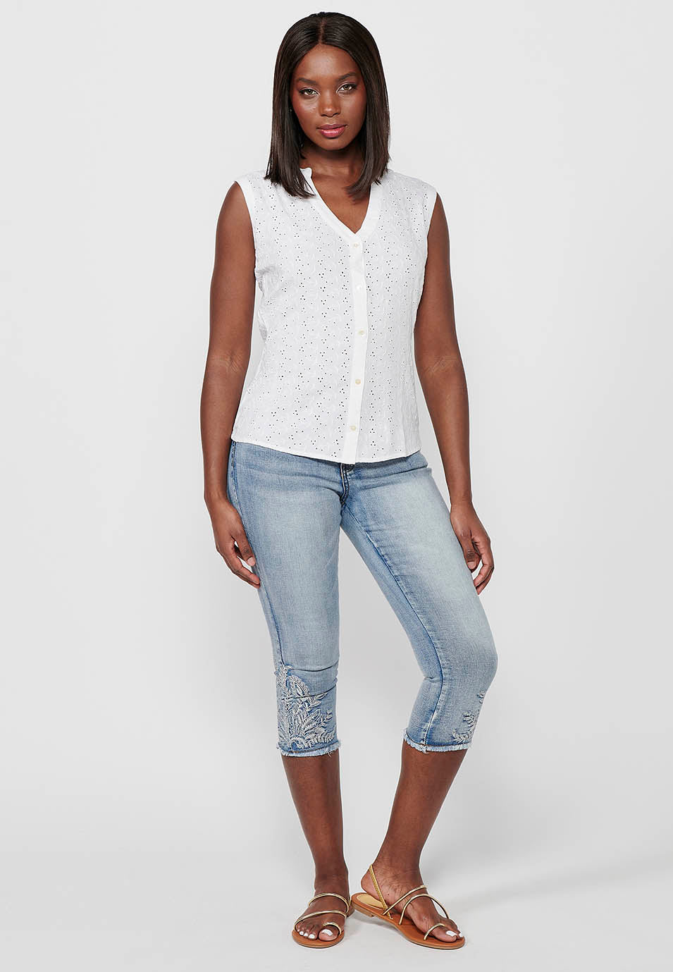 Blusa sin mangas de algodón con cierre delantero con botones para mujer | moda actual