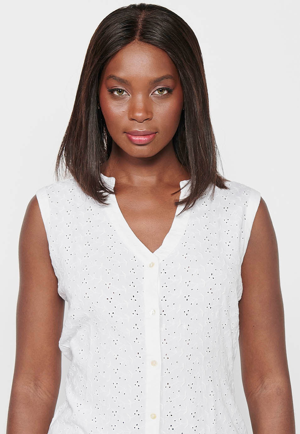 Blusa sin mangas de algodón con cierre delantero con botones para mujer | moda actual