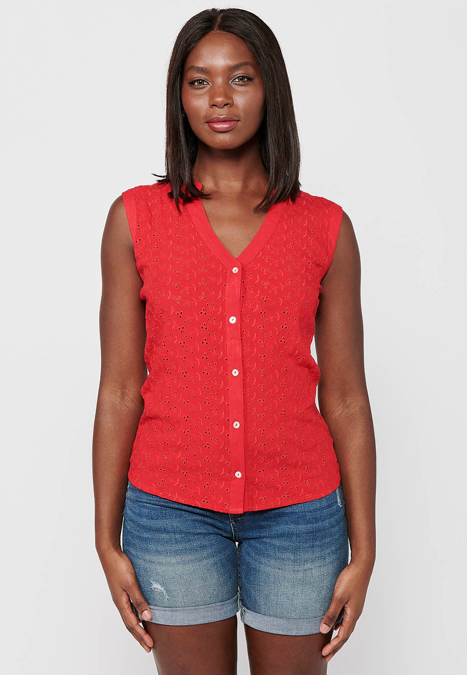 Blusa sin mangas de algodón con cierre delantero con botones para mujer | moda actual
