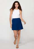 Falda corta con cintura engomada y detalle de volante para mujer | moda actual