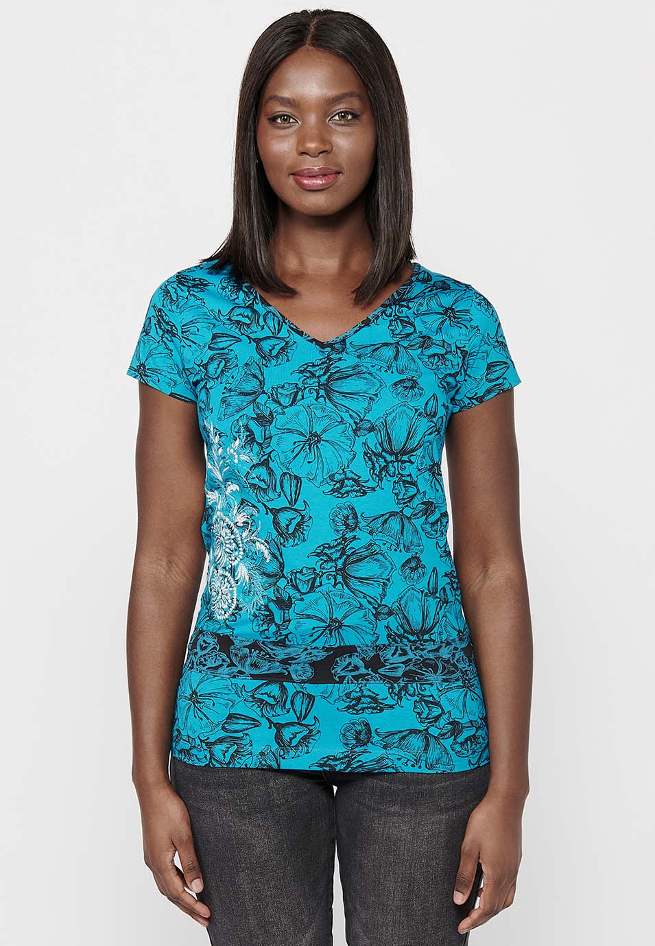 Camiseta larga de algodón de manga corta con detalle en la cintura y estampado floral con cuello pico de menta para mujer | moda actual