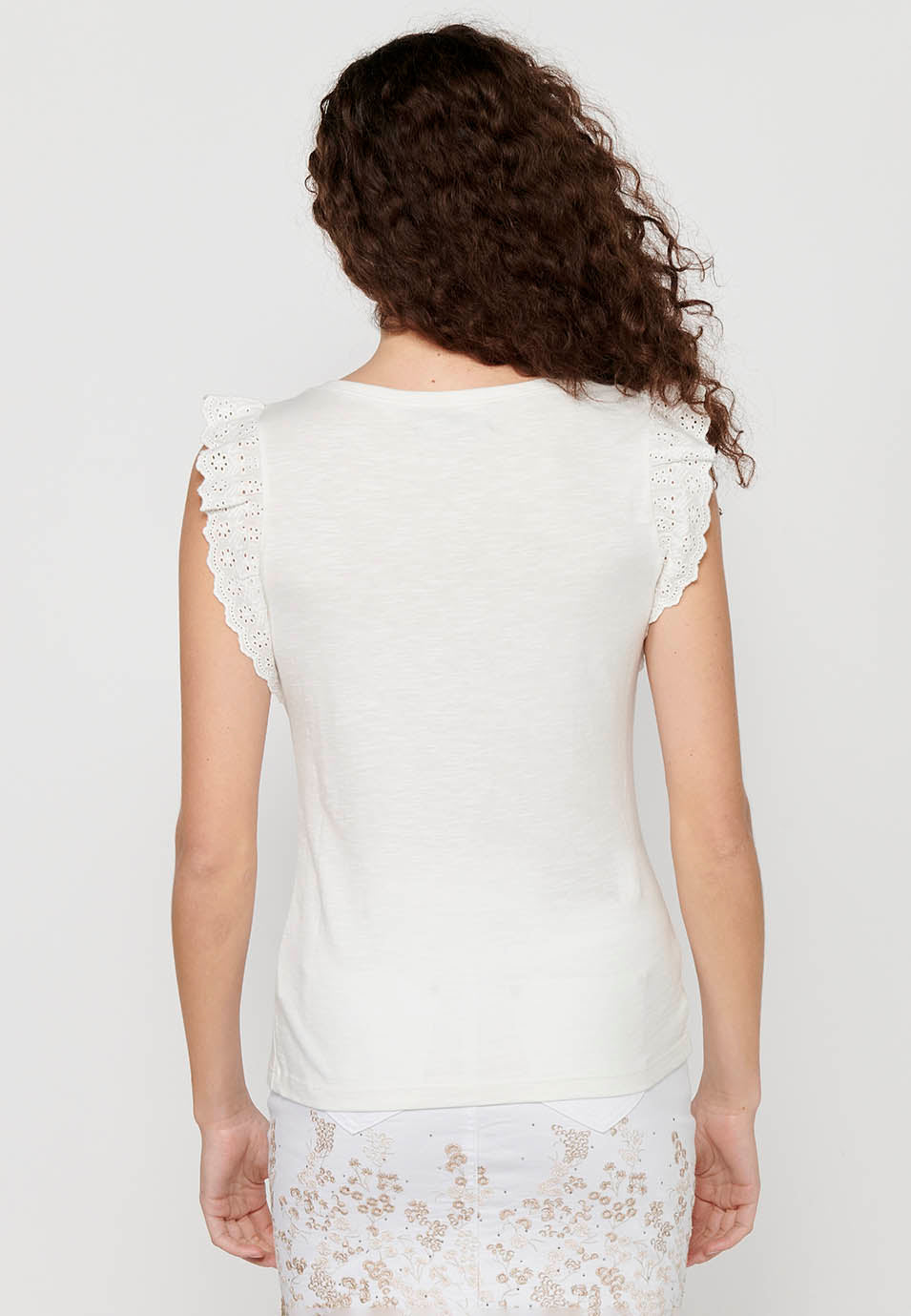 Camiseta sin mangas top de algodón con volantes en los hombros y detalle delantero para mujer | moda actual